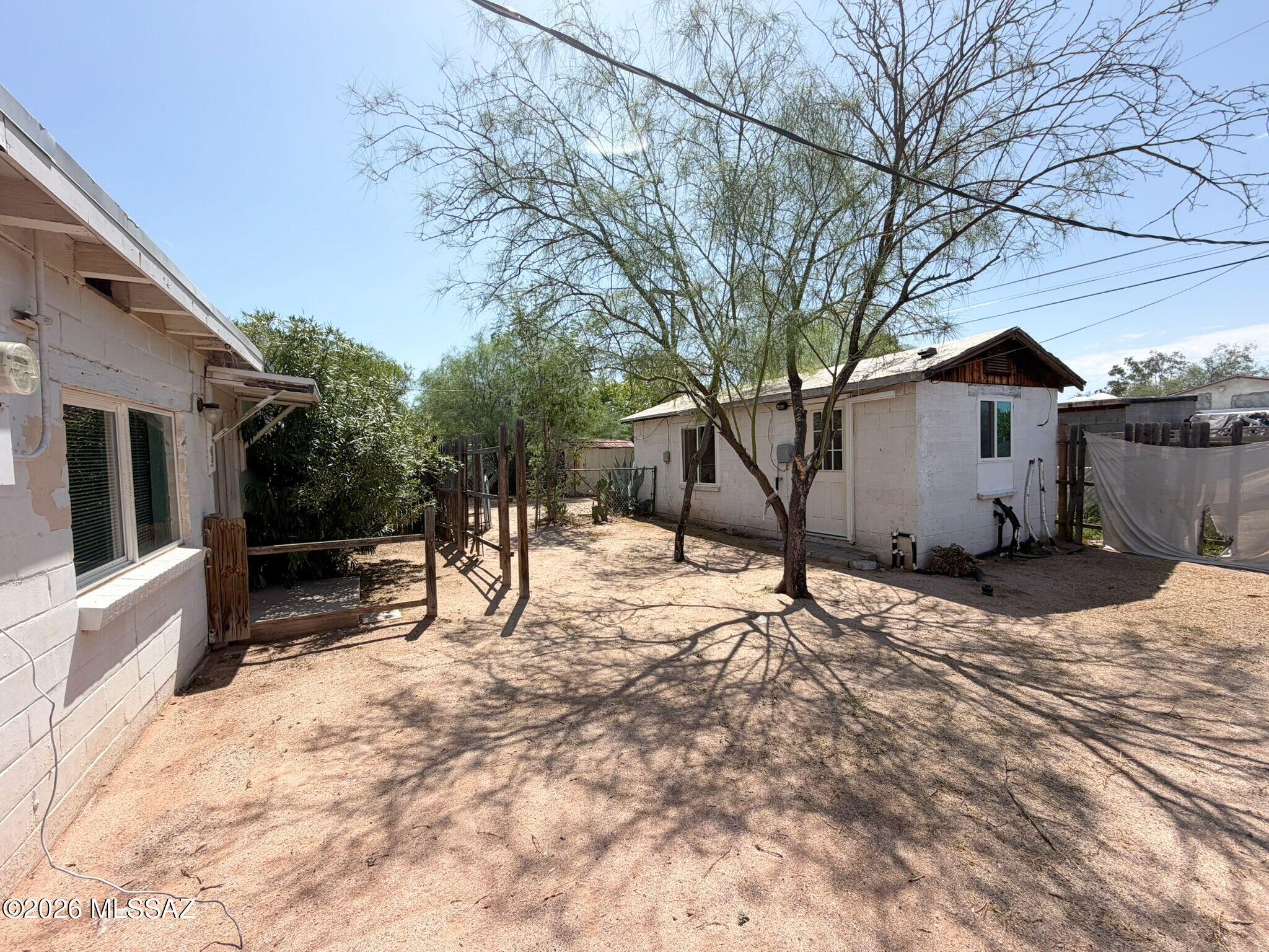 No Application Fees! Unique 1 bedroom plus separate studio, 2 bathroom Tucson duplex unit offering approximately 1,100 square feet of living space across two detached buildings with a private yard between them. The front unit features a comfortable living room, separate bedroom, full bathroom, and kitchen. Interior features include tile flooring throughout with no carpeting, exposed beam ceilings, neutral paint, abundant natural lighting, and a spacious bedroom with additional windows and separate closet. The kitchen includes a gas range, refrigerator, cabinet storage, and everything needed for convenient everyday living. The private yard is accessible directly from the living room and leads to the separate rear studio. This large open studio provides exceptional additional space and includes a sink along with its own private bathroom and shower. The unique two-building layout provides excellent flexibility for a home office, art or hobby studio, workspace, guest area, or other permitted use while maintaining separation from the primary living area.

Convenient central Tucson location close to shopping, restaurants, public transportation, neighborhood parks, Downtown Tucson, the University of Arizona, Pima Community College, and major employment centers. Easy access to Grant Road, Oracle Road, and I-10 provides convenient travel throughout the Tucson area.

All Denali Real Estate residents are automatically enrolled in the Resident Benefits Package (RBP) for $55.00/month which includes Renter's Liability Insurance, Credit Building to help boost the resident's credit scores with timely rent payments, up to $1M Identity Theft Protection, HVAC air filter delivery (for applicable properties), our best-in-class resident rewards program, and much more!