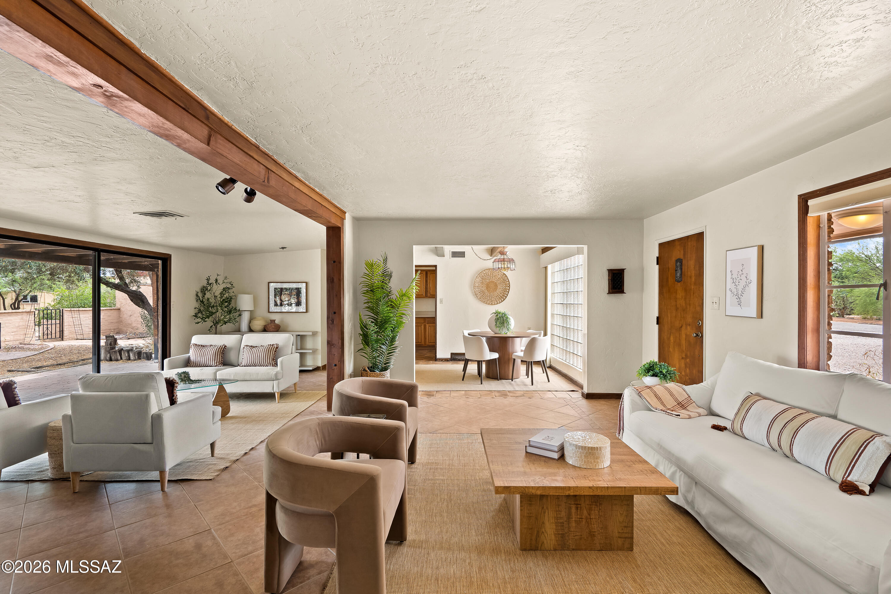 Sited on a large lot in the historic neighborhood of San Clemente, this inviting ranch home offers numerous significant updates including roof, HVAC system, plumbing lines, and sewer lines. Other features include a split bedroom floor plan with 3 beds/2 full baths in main home, beamed ceilings, wood burning fireplace in the family room and steel case windows . The large primary bedroom features a spacious walk-in closet and en suite bath. The 1 bed/1bath guest house comes complete with a spacious kitchenette and full bath, ideal for guests, extended family, or home office. Huge backyard with extended covered patio spaces, and room to expand! Convenient central location. Floor plan available!