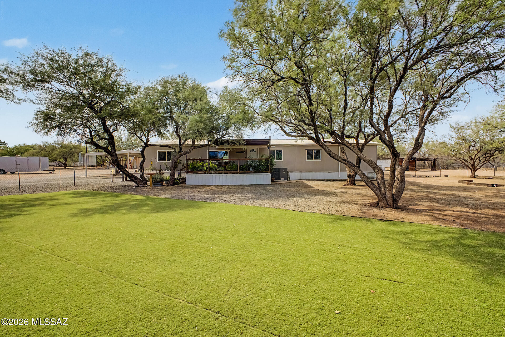 Nestled on 1.45 acres with stunning mountain views, this horse property features a 4-bedroom, 2-bath main home, a detached 1-bedroom, 1-bath guest house, a sparkling built-in pool, and a large garage. Enjoy the perfect combination of privacy, space, and versatility with room for horses, hobbies, and outdoor living.