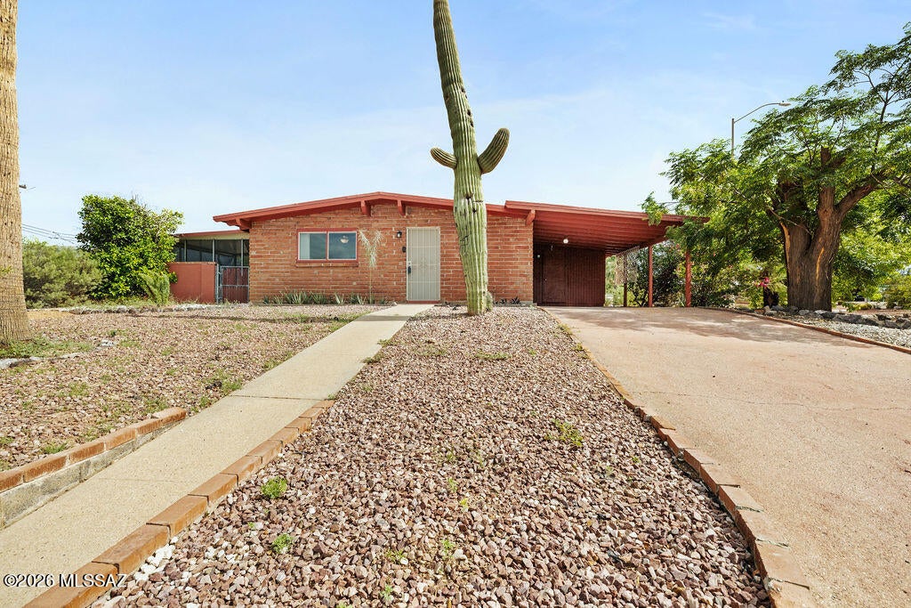 This 1958 adobe built home is packed with charm! Situated on a large corner lot w/ NO HOA, the house provides privacy & space. It has also been loaded with updates. All appliances are Energy Star certified & will convey. The updated dual pane windows are also Energy Star certified, and the doors have all been replaced as well. The sewer line is new, a new smart thermostat was installed, the dual flush toilets have been upgraded with new flanges, and a Ring alarm system has been installed. The hall bath features a stylish new vanity & modern lighting fixtures. As you step outside through the new french doors, the Arizona Room provides shade overlooking the chiminea & backyard. The ideal location places you in close proximity to shopping, restaurants, and multiple hospitals. It's a must-see!