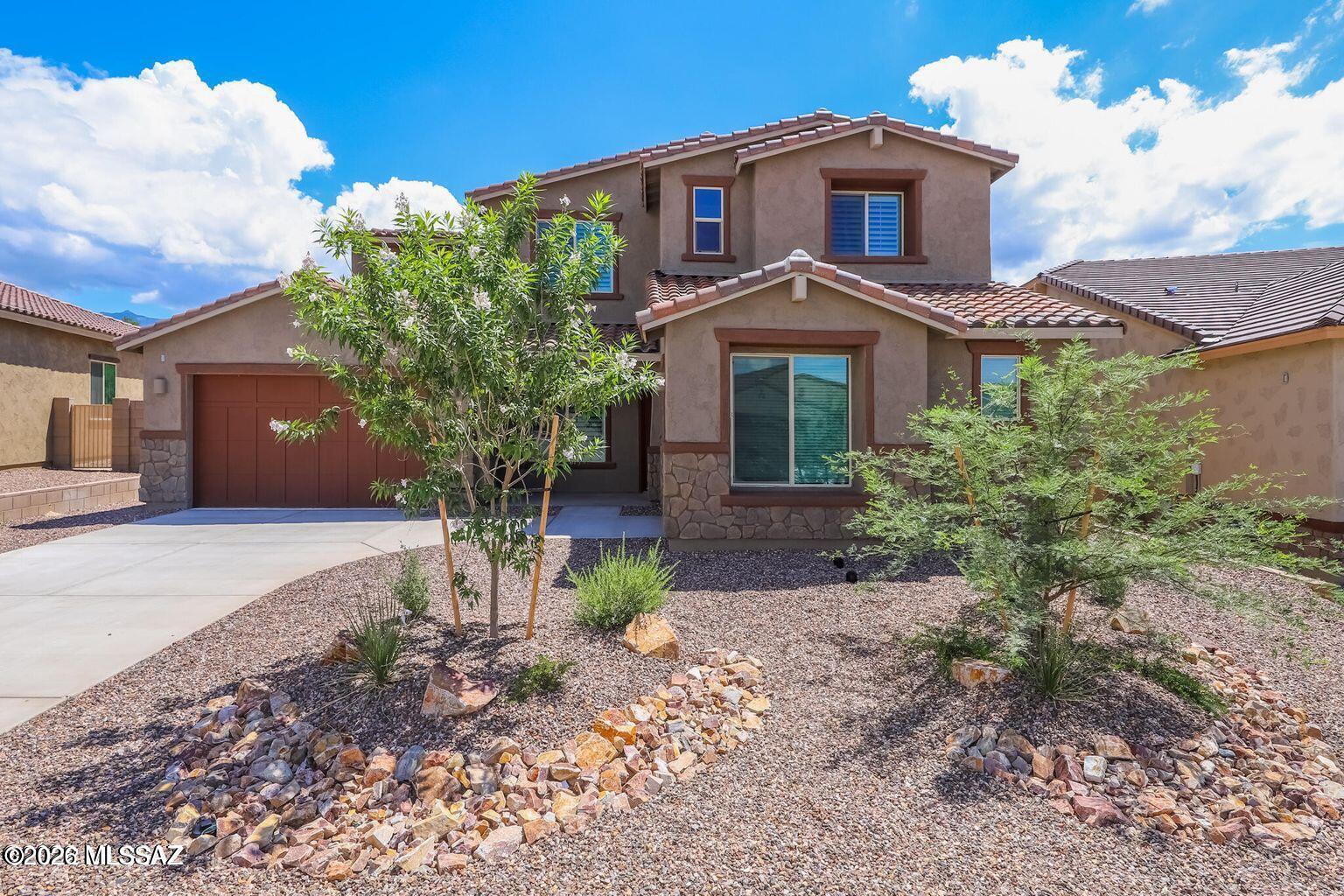 Charming 2 story home with Master on bottom floor, outstanding views with view fence, huge living room, large kitchen with island and butlers panty