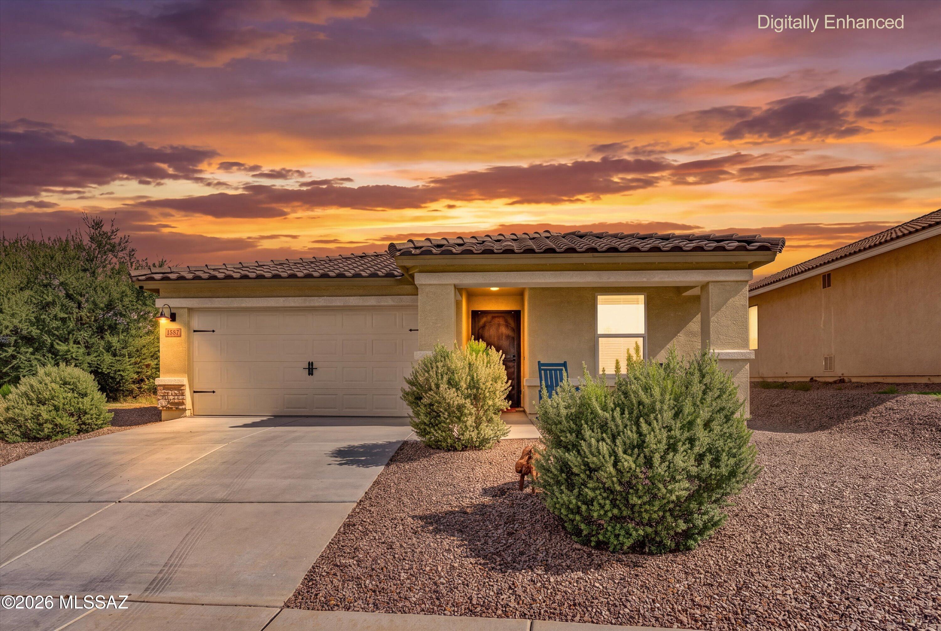 This beautifully maintained, one-owner home is packed with thoughtful upgrades inside and out! Freshly painted common areas, upgraded blinds, window screens, ceiling fans and updated door hardware add a polished touch throughout. The kitchen features an upgraded sink, backsplash, molding and Alexa-controlled wired lighting, while the laundry room doubles as a butler-style pantry with added cabinetry and a second refrigerator. Enjoy lighted, defogging primary bath mirrors, bidets in both baths, an epoxy garage floor, insulated garage door, WiFi opener and added lighting. Outside, relax or entertain on two paver patios surrounded by irrigated grass, in-ground sprinklers, drip-fed lantanas, solar block-wall lights and a patio fan. Washer, dryer and both refrigerators convey! NO HOA!