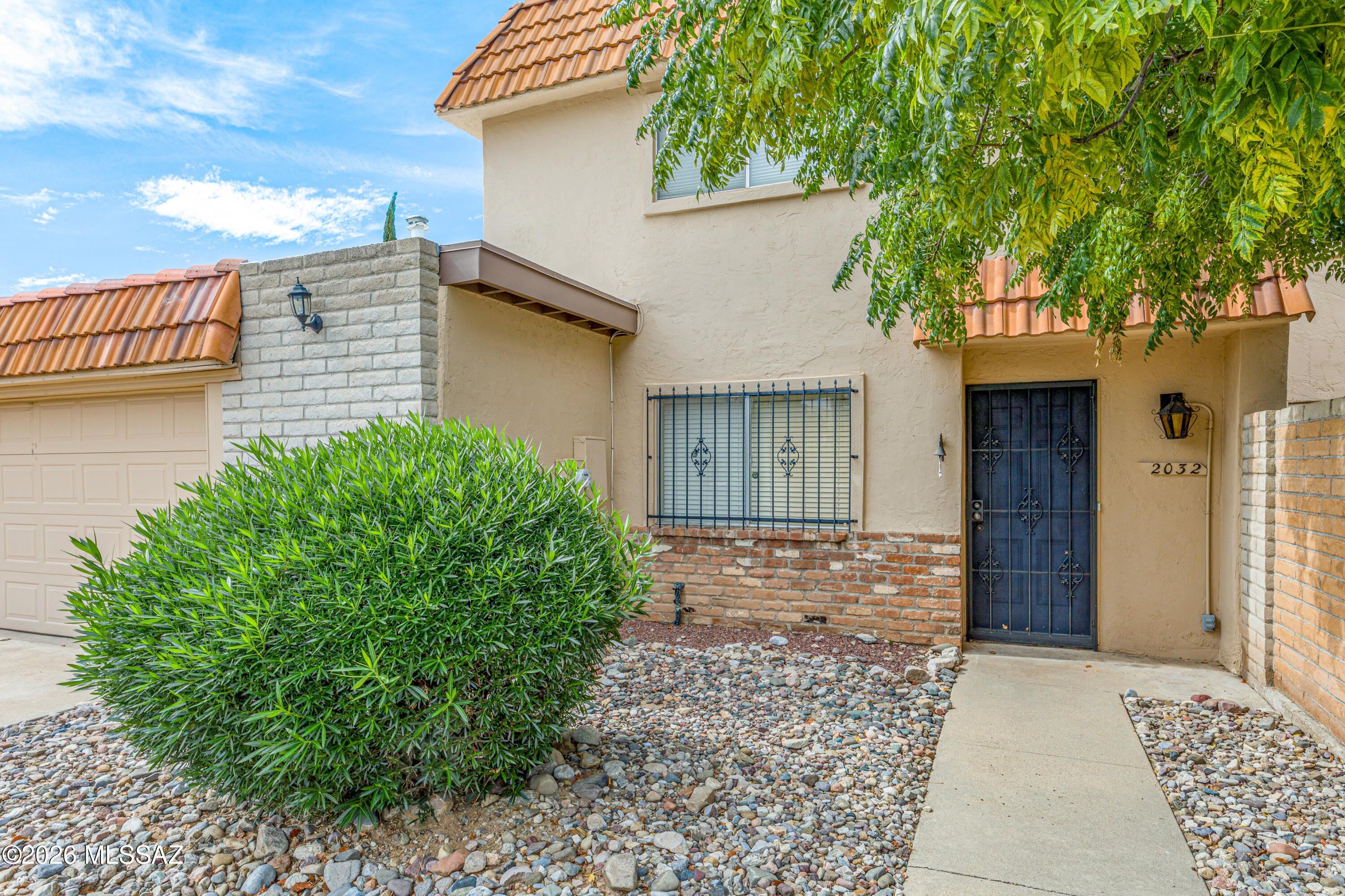RARE OPPORTUNITY IN ROLLING HILLS VILLAS! This 2 bedroom plus office/flex space townhome offers comfortable indoor and outdoor living, Catalina Mountain views, and a unique community perk: RV STORAGE available for residents! Need a third bedroom? The main floor office includes a closet, offering the flexibility to use the space as an additional bedroom.

Inside, the kitchen features hickory wood cabinetry, granite countertops, stainless steel appliances, and a stainless steel double sink. Both bedrooms are located upstairs, with the primary bedroom offering beautiful views of the Catalina Mountains. The washer, dryer, and refrigerator convey with the home. Additional highlights include a newer water heater, roof warranty, and termite warranty.

Enjoy the community pool, beautifully maintained common areas, and a convenient location close to Rolling Hills Golf Club, Pima Community College, restaurants, shopping, and more. Rolling Hills Villas also offers a dedicated RV storage area for residents, a unique feature that can be hard to find in a townhome community. With flexible living space, mountain views, community amenities, and RV storage, this home offers so much more than your typical townhome!