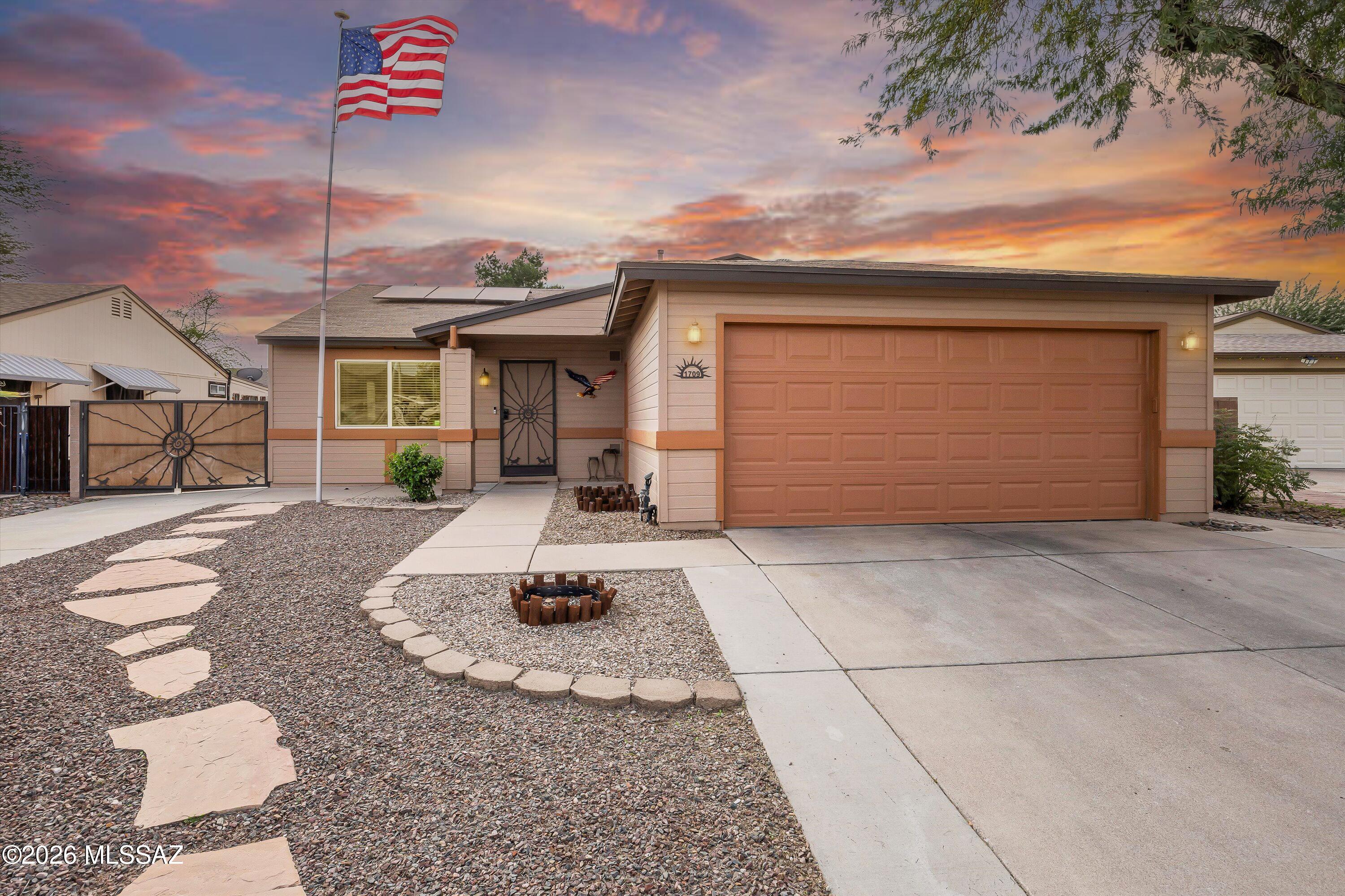This 3 bed, 2 bathroom home checks all the boxes; convenient location, easy freeway access, nearby parks, sidewalks, vaulted ceilings & a desirable split bedroom floor plan! From the moment you arrive, you'll appreciate the custom double gate with room for your toys & a 2 car garage that fits a full-size truck. The upgraded kitchen features maple cabinets, granite counters, & opens to comfortable everyday living spaces with tile flooring throughout. Spacious primary suite. Enjoy the beautifully landscaped backyard with mature citrus trees, turf, cozy firepit area & a shaded covered patio thanks to the ideal N/S orientation. Added bonuses include solar, 30 amp RV hookup & no poly pipes! SELLER WILL REPLACE OR OFFER A CREDIT FOR ROOF UP TO $10K WITH ACCEPTABLE OFFER!! Make us an offer today!
