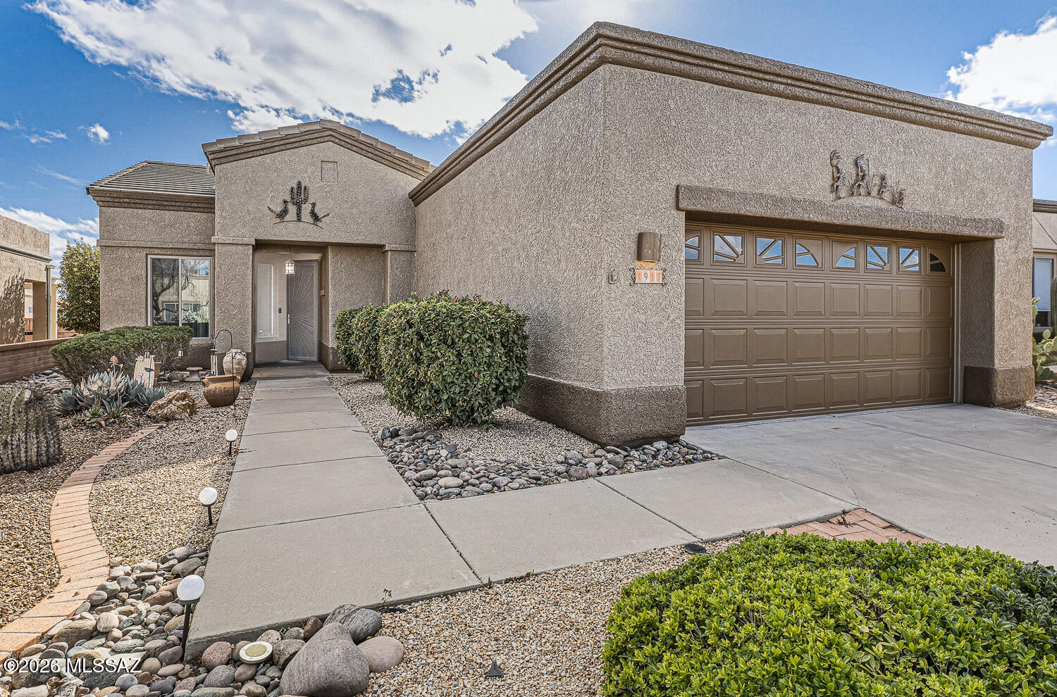 MOTIVATED SELLER! PRICE REDUCED TO JUST $299,000! This is your chance to own a spacious, well-updated home at an exceptional price. While it needs a few surface touch-ups, several major updates have been done, making this an incredible value. Offering 1,684 sq. ft., the home features 2 bedrooms, 2 baths, plus a den/office with a built-in Murphy bed for flexible guest space. The bright great room is filled with natural light, and recent updates include new tile flooring, quartz kitchen countertops, newer appliances, fresh exterior paint, new windows, and a new sliding glass door. The kitchen has 3 pantries for exceptional storage. Enjoy the covered patio with electric shades and partial mountain views.Conveniently located near golf, shopping, and dining.Don't miss this opportunity!