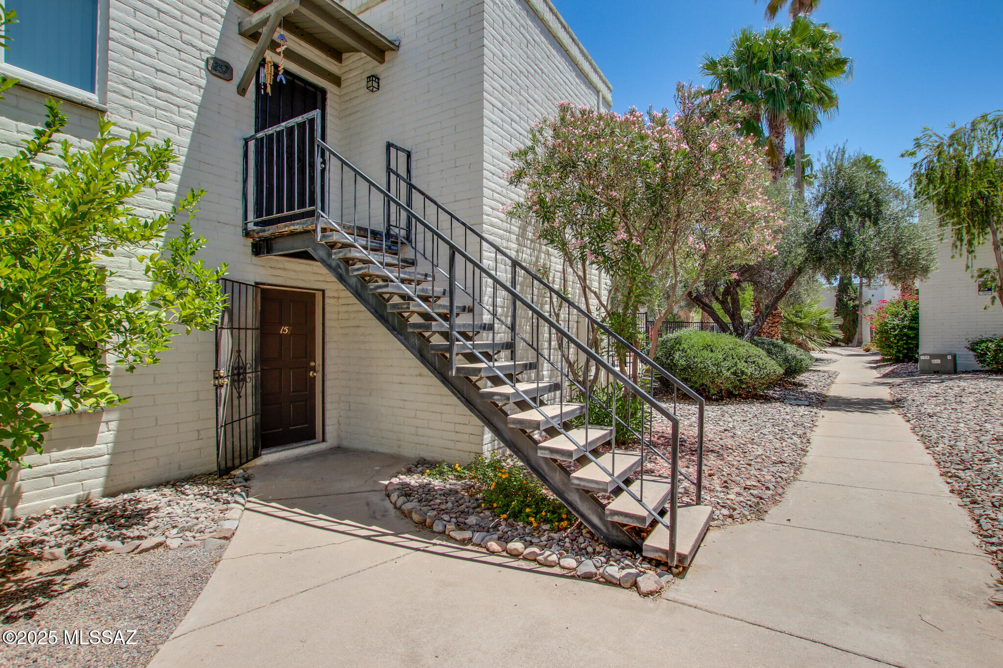This newly renovated first-floor condo is ready for easy move-in!  Enjoy an open concept living space with new flooring throughout, new cabinets and countertops in the kitchen and bathroom, and a brand-new AC installed in 2025!  Relax outside with easy access to the beautiful, HOA-maintained pool.  Two on-site laundry facilities are also available.