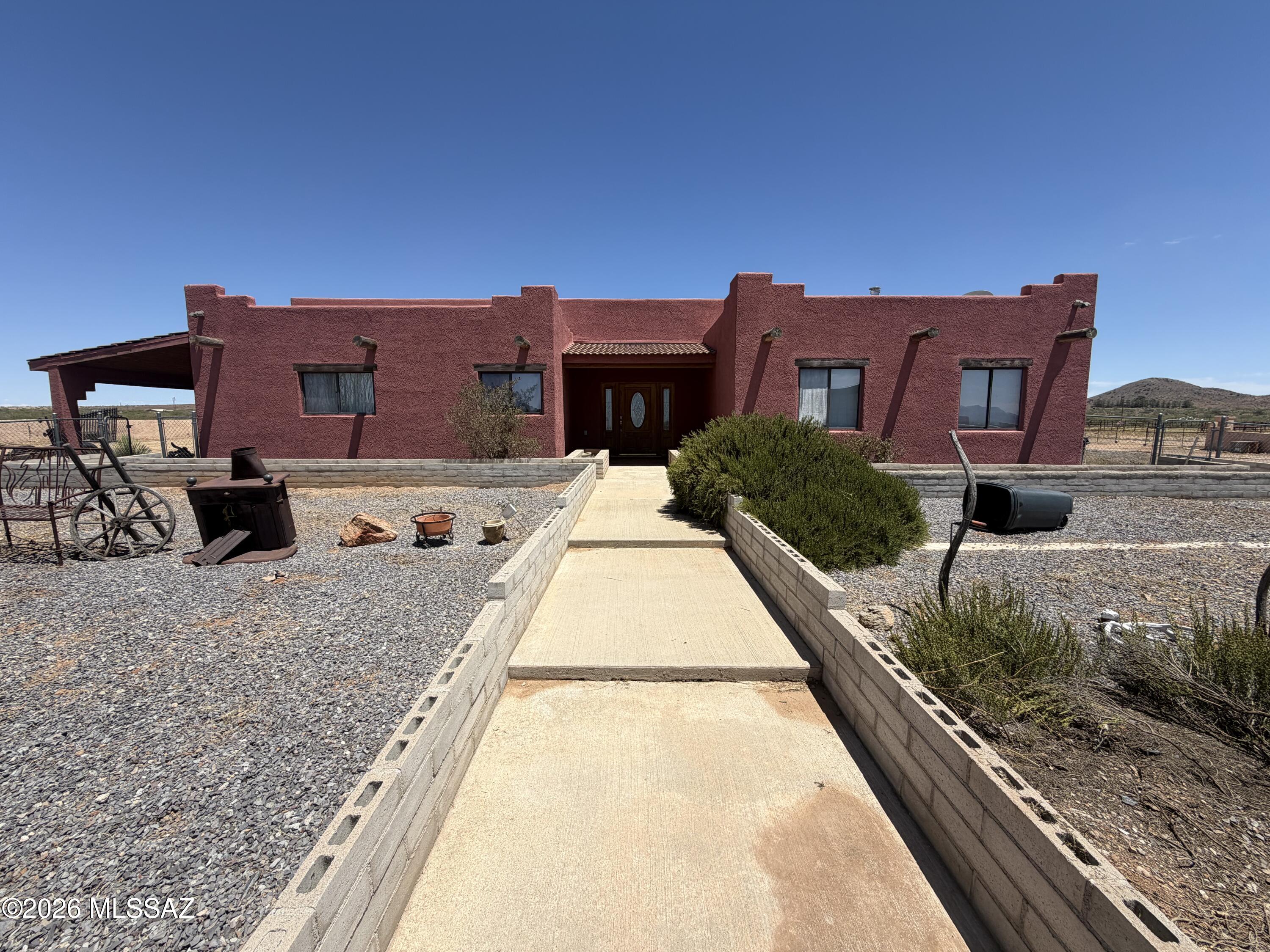 Escape to the wide-open beauty of Southern Arizona with this exceptional 132-acre property surrounded by breathtaking mountain views. Offering peace, privacy, and endless possibilities, this ranch-style property features a 1,965 sq. ft. home with 3 bedrooms, 2 bathrooms, and an attached 2-car garage.

The property is equipped with a newer drilled well and includes a large lean-to, perfect for storing hay, equipment, vehicles, or ranch supplies. Expansive views of the mountains to the north create a stunning backdrop from sunrise to sunset.

The home is ready for your vision and personal touches to bring it back to life and make it shine once again. Whether you're looking for a working ranch, horse property, recreational retreat, or simply a place to enjoy Arizona's wide-open spaces, this property offers an incredible opportunity. This is the parcel numbers for the other 3 
202-52-003
202-52-002B
202-51-011

With 132 acres of scenic land, spectacular views, and room to roam, the possibilities are truly endless.