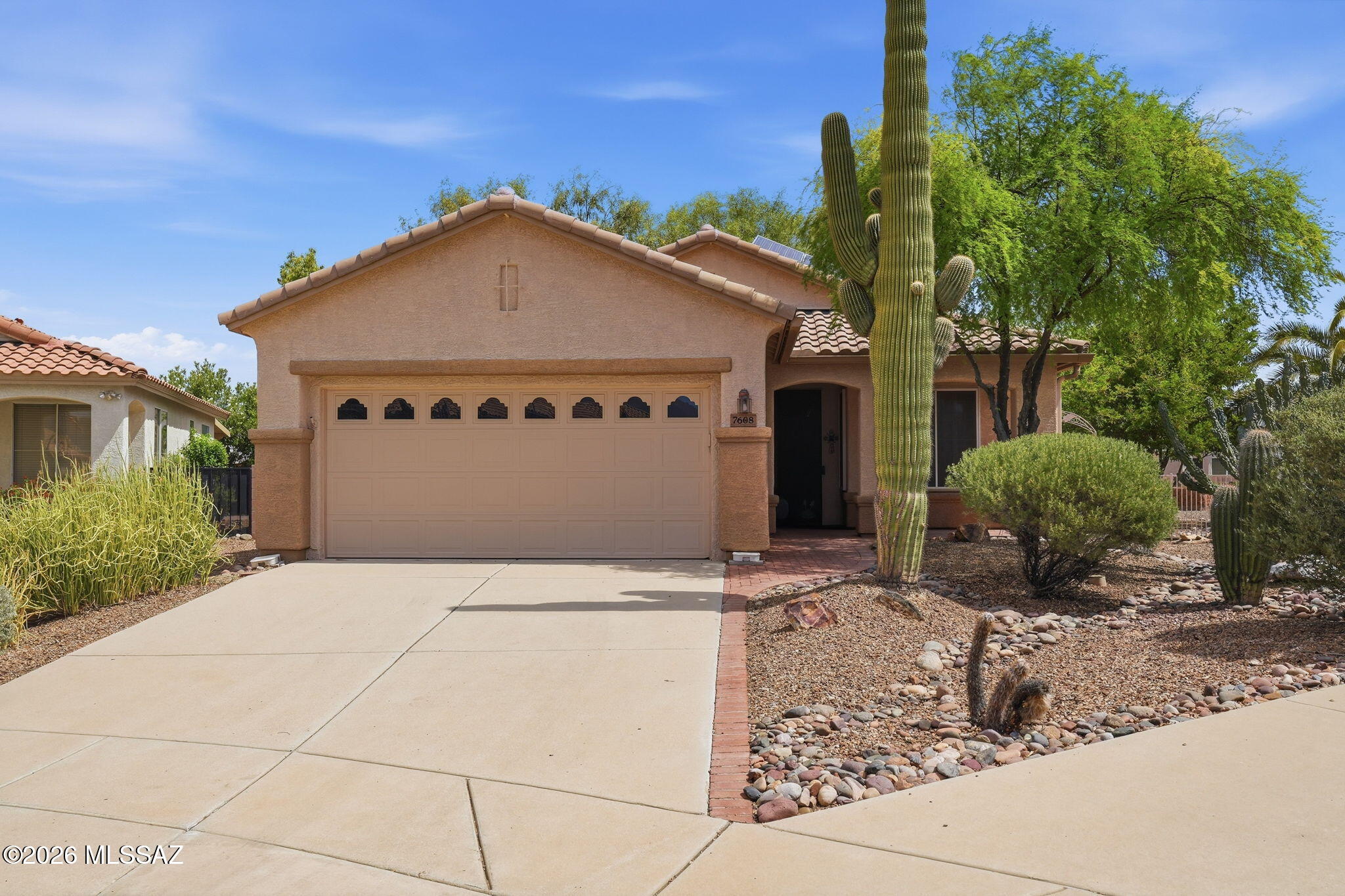 This single level 2 bedroom, 2 bath offers 1,296 sq ft on an oversized .20-acre cul de sac lot with mountain views in Sunflower at Continental Ranch, a 55+ community. Inside: freshly painted interior, new luxury vinyl plank flooring, plantation shutters on every window, and a full wall of built-in shelving in the living room. The open kitchen has a breakfast bar, tall pantry cabinet and newer appliances. Primary suite with walk-in closet and step-in shower. Security screens on every window and door, water softener, floor-to-ceiling garage storage. Out back, a covered patio and wide paver patio open to an unusually large yard. Paid off solar and newer HVAC with air purification system. Community amenities include; clubhouse, fitness room, pool, tennis, pickleball, bocce, and putting green