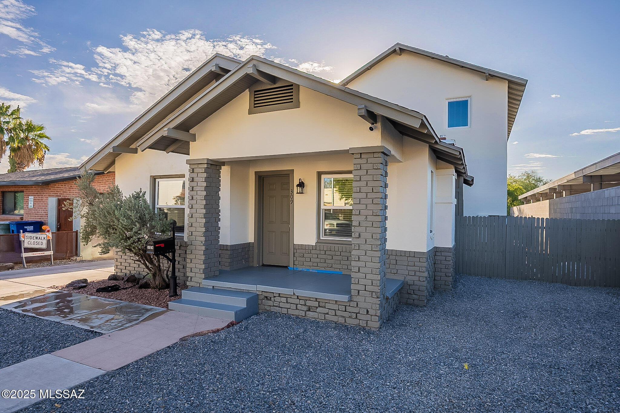 Seller will accept, or counter offers between $850,000 and $875,000 dollars. Newly built seven bedroom, five bath home near the UofA! Designed for flexibility with two full kitchens, multiple living areas, and modern finishes including stainless steel appliances and wood laminate floors. Each level / unit has a private entry and are completely separate. Enjoy the modern pool, turf yard, and ample onsite parking. Perfect for an owner occupant looking to live in one unit and rent out the other, or as a strong investment in a prime location.