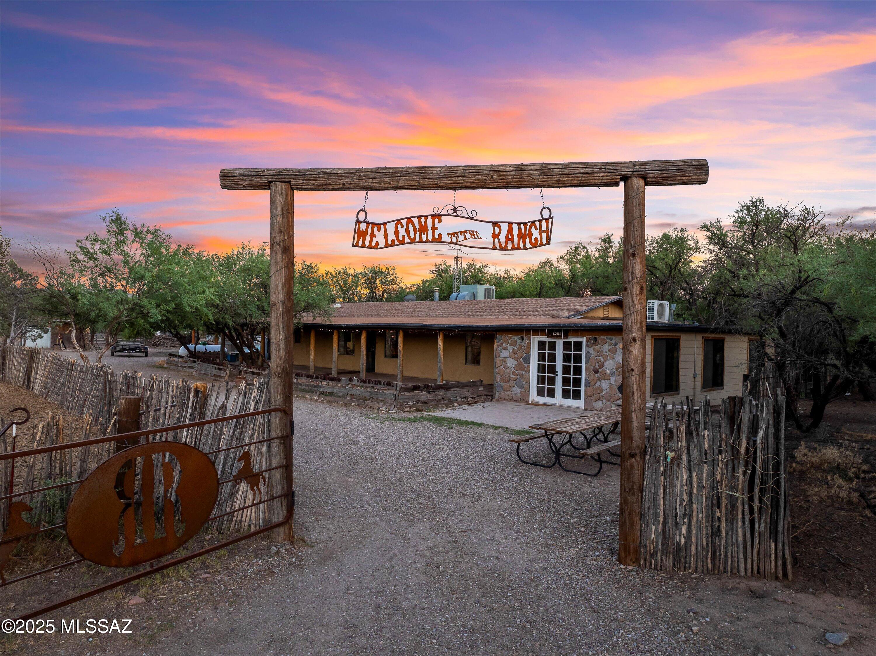 Welcome to The Ranch! This fantastic property was used as a guest ranch and is ready for its new owners. The property comprises TWO separate parcels totaling 19.96 acres. It features a main home with two bedrooms, two bathrooms, and a large bonus room they use as the dining hall for guests, and a bunkhouse. It also has a large tack room, tool shed, bonus room, covered hay barn, chicken coop, a large round pen, smaller round pen, five large turn outs, stalls, arena, two wells (one on each parcel), 2 RV hook ups, owned propane tanks, high grade generator, a 2 bed, 1 bath home on 10 acres with a shop, horse turn outs and 4RV hook ups, and an additional 10 acres of vacant land with old growth mesquite trees, 360 degree million dollar views, and so much more!
The  main property is zoned