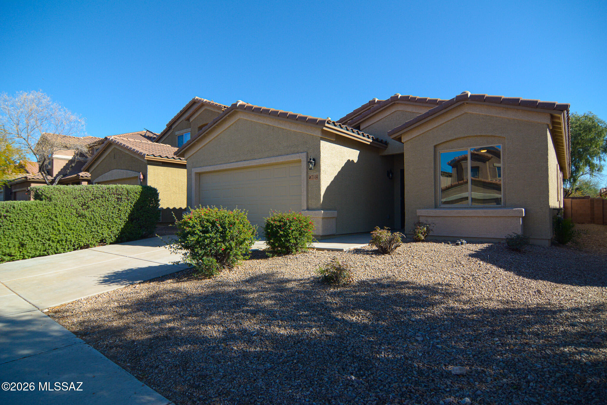 Beautifully remodeled contemporary-style home. Located in a desirable Southeast Tucson location. Minutes from the I-10. New wood look LVP flooring. Contemporary kitchen with stainless steel appliances. New custom interior paint. Spacious owner's suite with a walk-in closet. Contemporary bathrooms. New carpet and padding in bedrooms. Ceiling fans in each room. Fenced yard with mature tree and decorative gravel. Two-car garage. Upgraded door hardware and light fixtures. This home shows beautifully.