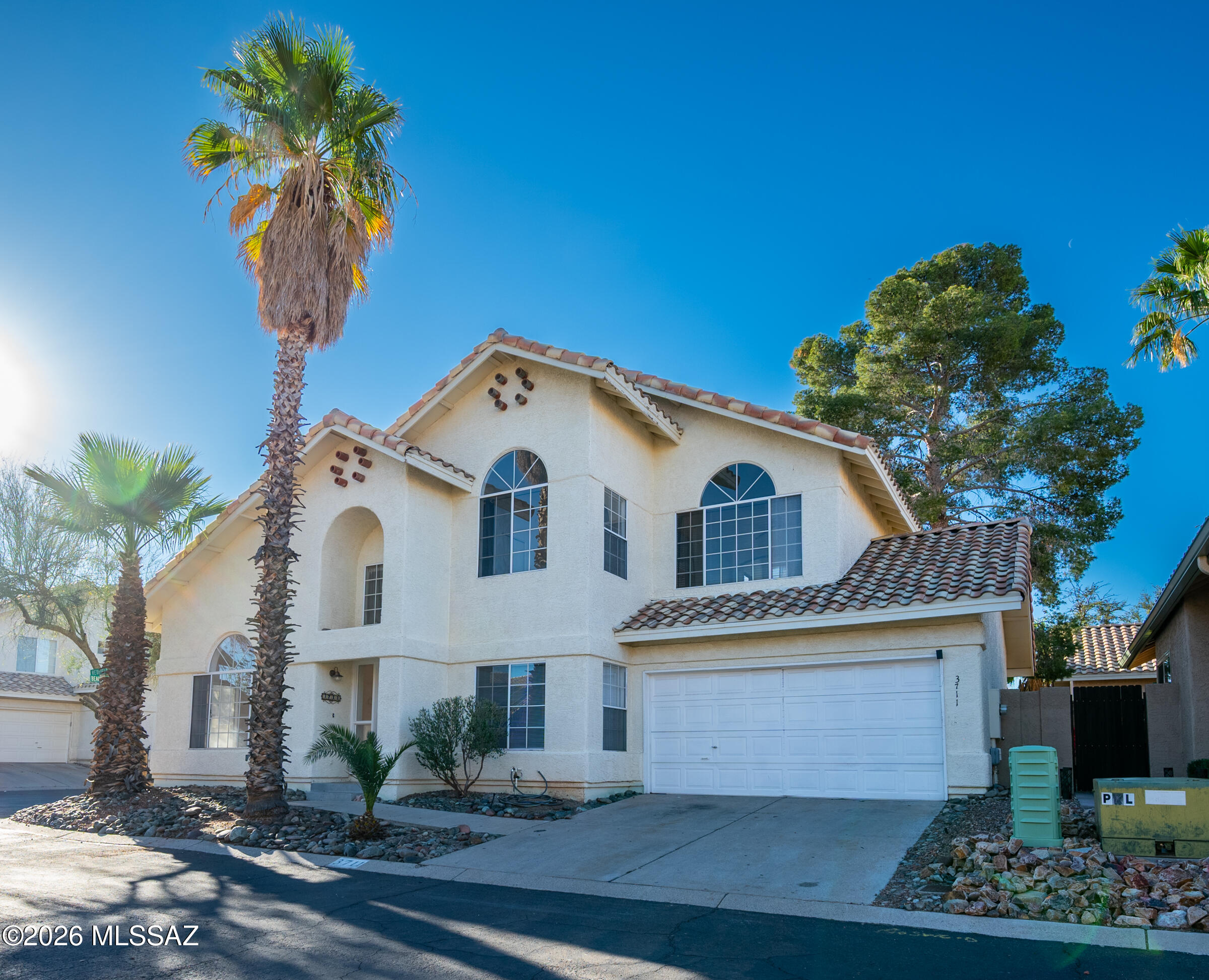 Welcome to this charming Northwest Tucson home offering comfort, functionality and low-maintenance living. This well-designed two-story residence features 4 bedrooms, 2.5 bathrooms and approximately 1,590 sq. ft. of living space, providing plenty of room for family, guests, or a home office.  Step inside to a bright and inviting floor plan with a spacious living area that flows seamlessly into the dining and kitchen spaces, perfect for everyday living and entertaining. The kitchen offers ample cabinet storage and workspace, while the layout allows for easy connection with the rest of the home. Upstairs you'll find comfortable bedrooms, including a generous primary suite. The home also features central air conditioning, a two-car garage, and durable tile roofing designed for Arizona living. Outside, enjoy a low-maintenance yard and covered patio, ideal for relaxing evenings or weekend gatherings. Located in a desirable Northwest Tucson neighborhood with community pool near parks, shopping, and dining, this home offers convenient access to everyday amenities while maintaining a peaceful residential setting.
Don't miss the opportunity to own this move-in ready home in a great Tucson location!