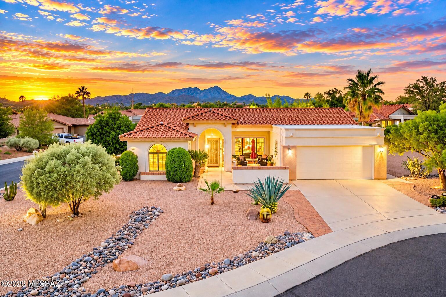 Majestic mountain views and Arizona sunsets set the stage for this bright and inviting Silver Creek home in Sun City Oro Valley! Situated on a desirable corner cul-de-sac lot, this 1,524 sq. ft. home captures magnificent Catalina Mountain views from the front patio and living room, with mountain and sunset views from the backyard. Offering 2 bedrooms, 2 baths, and an office with custom built-ins, the open floor plan features a spacious living and dining room plus an open kitchen and den. Plantation shutters add timeless appeal, while garage storage offers extra convenience. Offered furnished, this home is ready to enjoy! Experience Sun City's exceptional active adult lifestyle with an 18-hole golf course, two pools, fitness center, tennis, pickleball, clubs, and so much more!