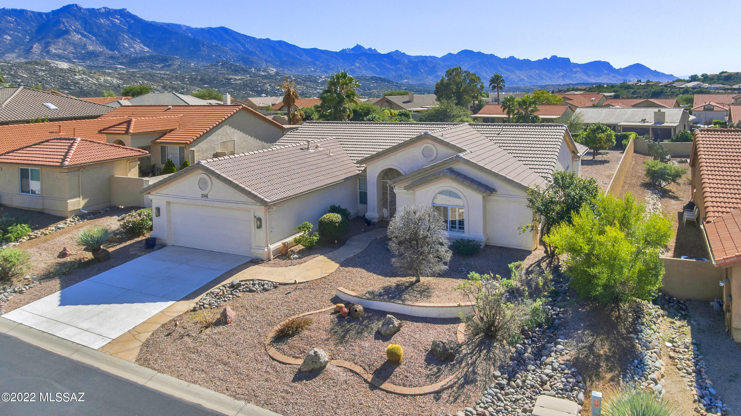 This unfurnished Topaz model features incredible mountain views from the backyard! The interior has two bedrooms plus a den/office with a murphy bed, a large living room and separate family room/dining area. Extended laundry room and two-car garage feature lots of storage and built-in cabinets. All appliances included, with washer/dryer. The large and private backyard features great mountain views along with mature citrus trees and a huge covered patio. There is so much to enjoy at this beautiful home. Owner pays HOA fees, landscaping, and pest control, while tenant pays all other utilities. Please contact property manager with any questions and to schedule a showing.