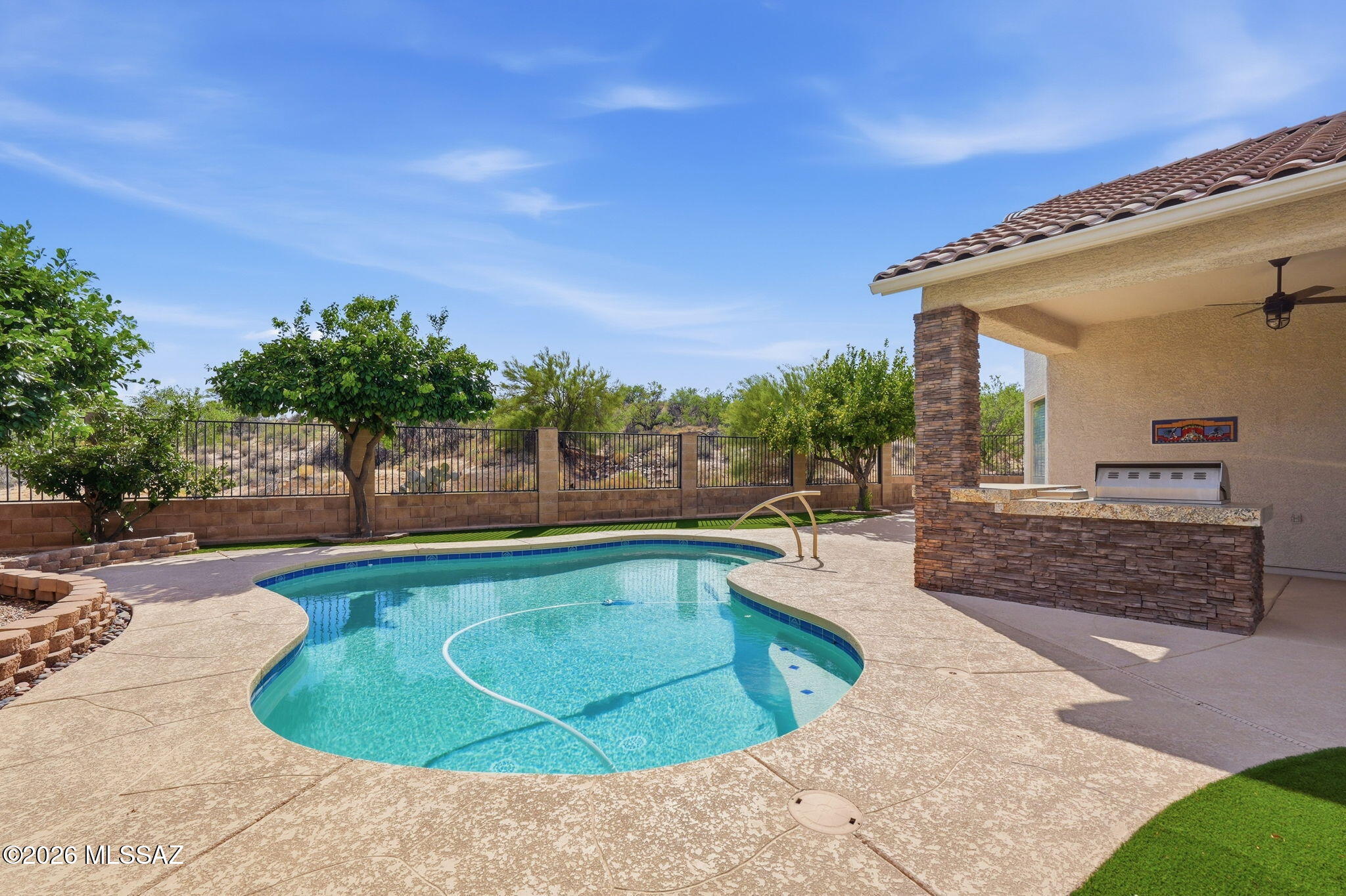 Every once in a while there comes along an Amazing Home with an extremely Private Home site  on a Quiet cul-de-sac at the top of a hill, with a Sparkling Heated Pool, Mature Citrus, Outdoor LIving Areas, Built-in BBQ, Firepit, Turf, and did we mention, PRIVACY? Inside you'll find a HUGE OPEN GREAT ROOM, Island Kitchen with Stainless Appliances, Fireplace, Roomy Master Suite, Two Guest Bedrooms PLUS another Special Room up front: Den? Office? Studio? Exercise? If you've been searching for that one really Special Property- one that has been Well-maintained and is CLEAN (There's a concept for you!) don't miss this one! Call Listing Brokers for your personal tour TODAY!