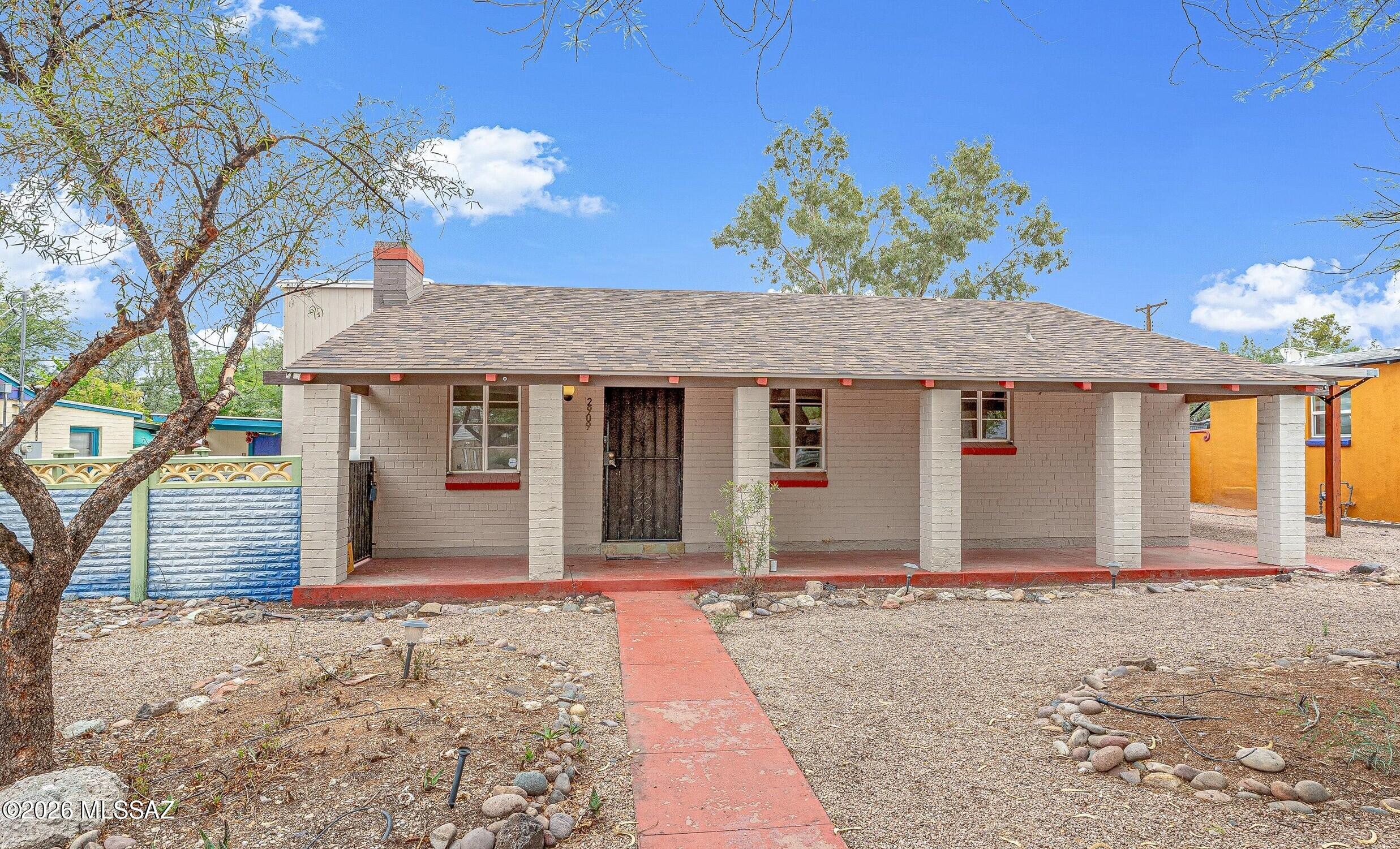 Charming 1940s Blenman Elm bungalow with historic property tax benefits. Main home is a 2bed, 2 bath with bonus space and thoughtfully updated while preserving its original character, this home offers the perfect blend of vintage charm and modern convenience. The spacious primary suite features a large walk-in closet w/ laundry, while the versatile bonus room is ideal for a home office. Major updates include new plumbing (2019), HVAC (2022), roof (2023), corrugated metal fencing (2024), and a tankless water heater. Relax in the private backyard beneath mature shade trees, complete with a covered ramada, paver patio, and peekaboo mountain views. The detached guest space offers endless possibilities as a guest suite, studio, or office.