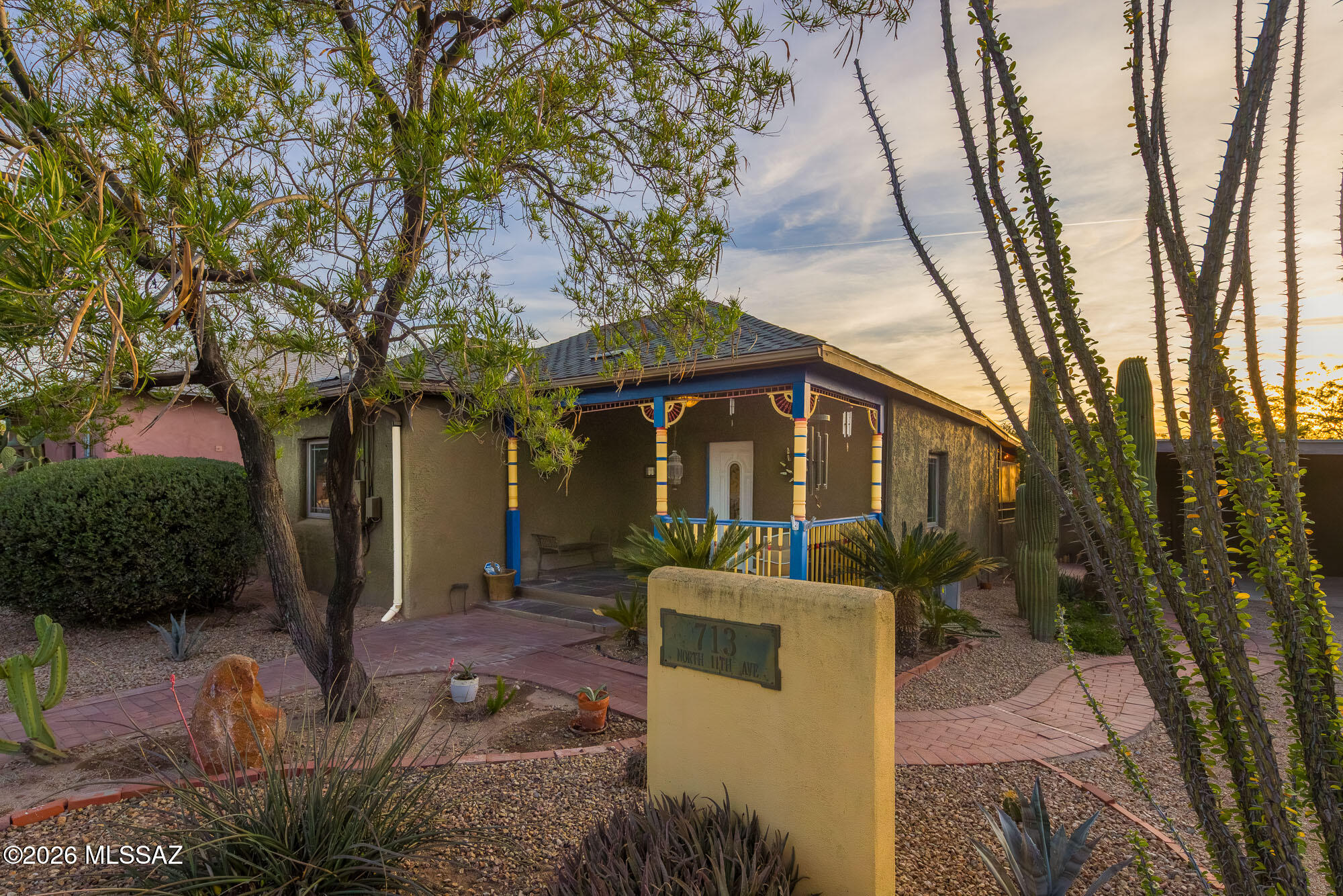 A rare gem in the heart of Tucson, this 1916 bungalow blends historic charm with an unexpectedly expansive private backyard desert oasis, rarely found in the area.

Located in historic Dunbar Spring, minutes from downtown and the U of A, this home blends preserved character with thoughtful updates, including a newer kitchen , dual pane windows and a stunning walk-in shower.

The true standout is the spacious backyard, offering desert landscaping, multiple areas to relax, and rainwater supported irrigation. The custom 12 x 12 saltwater spa/spool has its own landscaped and safely gated patio, Enjoy either a cool plunge or heated spa jets.

A highly successful vacation rental for over 10 years, consistently loved by guests.  The backyard has accommodated events of up to 60 people. Located in a separate charming side patio area. Dunbar Spring, a neighborhood mix of Victorian, Territorial, & Bungalow architectural styles.  Near Downtown, UofA, Museums, art and Eclectic shopping of Tucson's 4th Ave!