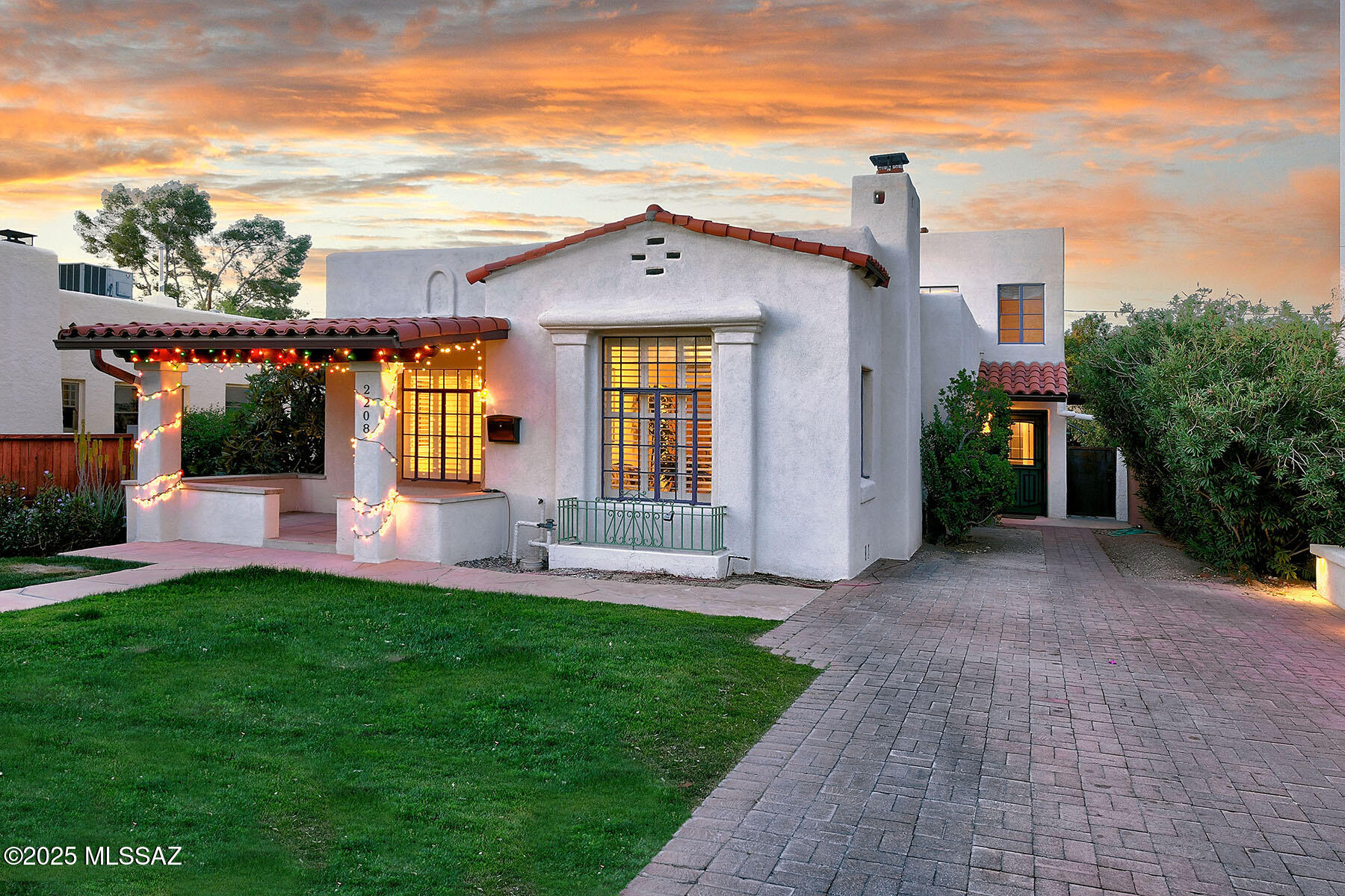 Situated on the highly sought-after 3rd Street in the historic Sam Hughes neighborhood, this charming 4-bedroom, 4-bathroom residence seamlessly blends character and comfort.  Newly installed HVAC System, Updated Primary bathroom & New carpet in the primary suite. The main level features a spacious living room, formal dining room, two bedrooms, and a full bathroom. A cozy breakfast room with a fireplace adjoins the kitchen, which showcases classic Mexican tile and modern stainless steel appliances.
Upstairs, the primary suite offers a private retreat complete with an ensuite bathroom and a secluded patio. Plus, a two room basement & storage is a bonus! (not included in sq ft)  An additional guest suite, also with its own bathroom, and a generous storage room provide flexible living. Outdoors, the lushly landscaped backyard is a true oasis, featuring; a sparkling pool and spa, mature fruit trees, a cactus garden, 1800 gallon, water harvesting system, reclamation water hookup at the curb, and a covered patio ideal for entertaining or relaxing. Ample off-street parking is available, all just steps from the University of Arizona, Himmel Park, and an array of local dining and shopping options. This home is a contributing property to the National Historic Registrar and offers a tax credit to owner occupants.