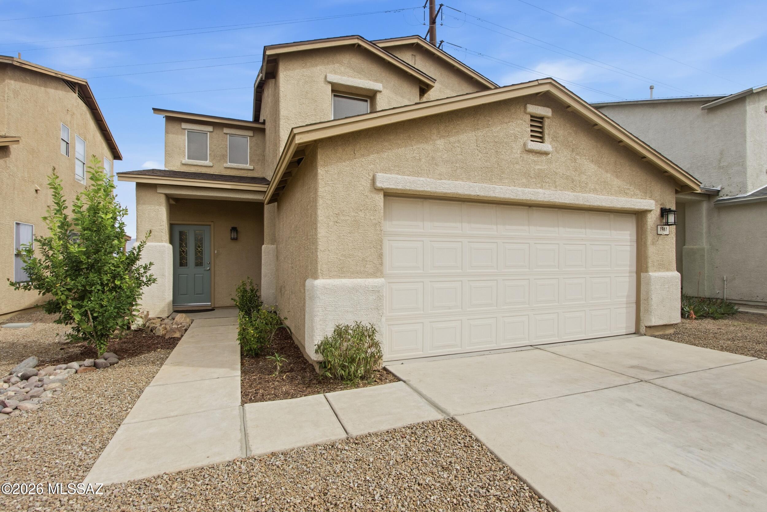 Welcome to your new home! This beautifully maintained 3-bedroom, 2.5 bath home is clean and move-in ready. Enjoy mountain views from the living room and dining area, and from the spacious primary bedroom upstairs. Recent updates include a new hot water heater, fresh paint, and a well-lit kitchen with new recessed lighting. The front yard provides easy care while the backyard is a blank canvas just waiting for your vision. All of this is conveniently located to shopping, restaurants, and is approximately one mile from the loop. Submit your offer and start dreaming today!