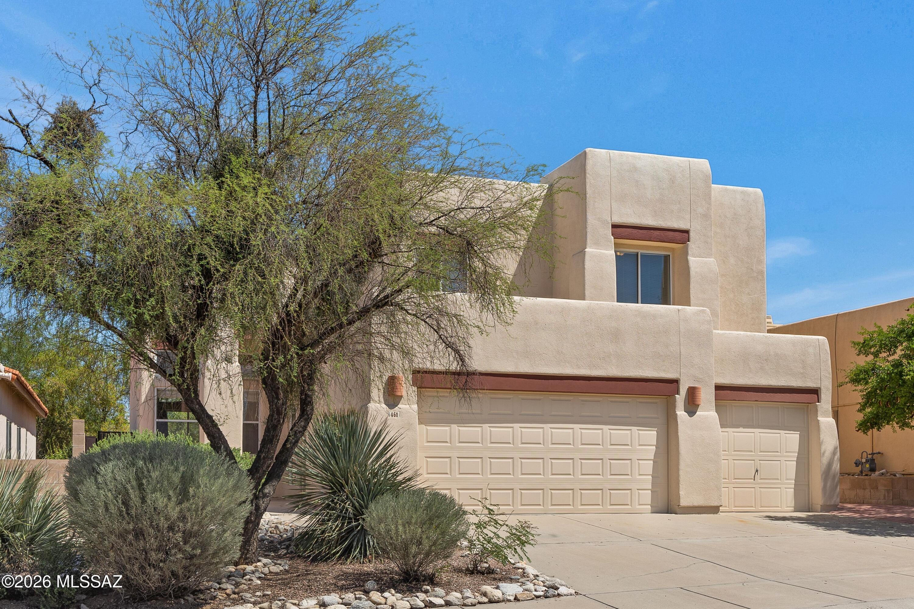 Welcome to this beautifully maintained five-bedroom, three-bath home offering an impressive combination of space, privacy, recent updates, and breathtaking Catalina Mountain views--all at a price under $500,000!

From the moment you step through the front door, soaring vaulted ceilings create a grand and inviting entry, filling the home with an open and spacious feel. The property has been refreshed with all-new interior and exterior paint, giving it a clean, updated appearance that is ready for its next owner. New carpeting has also been installed in every bedroom, providing added comfort and a fresh finishing touch throughout the private living spaces.

With five generously sized bedrooms and three full bathrooms, this home offers exceptional flexibility for a variety of needs, wheth you are looking for additional bedrooms, guest accommodations, home office space, or room to spread out. A desirable three-car garage provides abundant space for vehicles, storage, recreational equipment, or a workshop area.

One of the standout features of the home is the private second-floor outdoor patio located just off the primary bedroom. Step outside and enjoy beautiful north-facing views toward the Catalina Mountains--a wonderful setting for morning coffee, evening relaxation, or simply taking in the surrounding Arizona scenery.

The outdoor living space continues into the backyard, where extensive pavers create an attractive, low-maintenance environment with plenty of room for outdoor furniture, entertaining, or enjoying Arizona's beautiful weather. Adding to the home's appeal, the property does not back directly to another residence. Instead, a common-area buffer provides additional separation and privacy, creating a more open and peaceful backyard setting.

Thoughtfully maintained and recently refreshed, this home combines five bedrooms, three bathrooms, a three-car garage, vaulted ceilings, new interior and exterior paint, new bedroom carpeting, low-maintenance outdoor spaces, added backyard privacy, and beautiful Catalina Mountain views--all for under $500,000.

This home is move-in ready and waiting for its new owner. Schedule your private showing today and experience the space, views, privacy, and value this exceptional property has to offer!