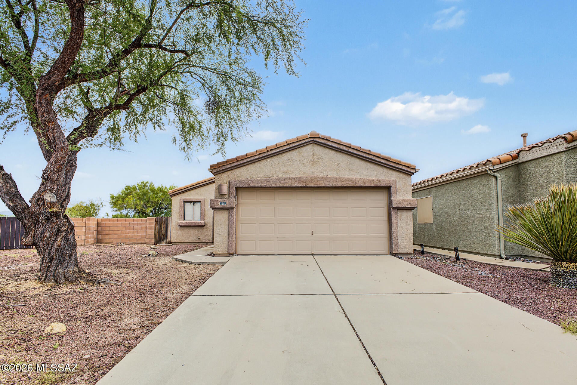 This 2bed/2bath home in a lovely, clean and quiet area is priced to sell!  It boasts a cozy kitchen with bar, large bedrooms and closets and large, block fenced yard, perfect for pets.  No rear neighbors, awesome mountain views. Great east side location.