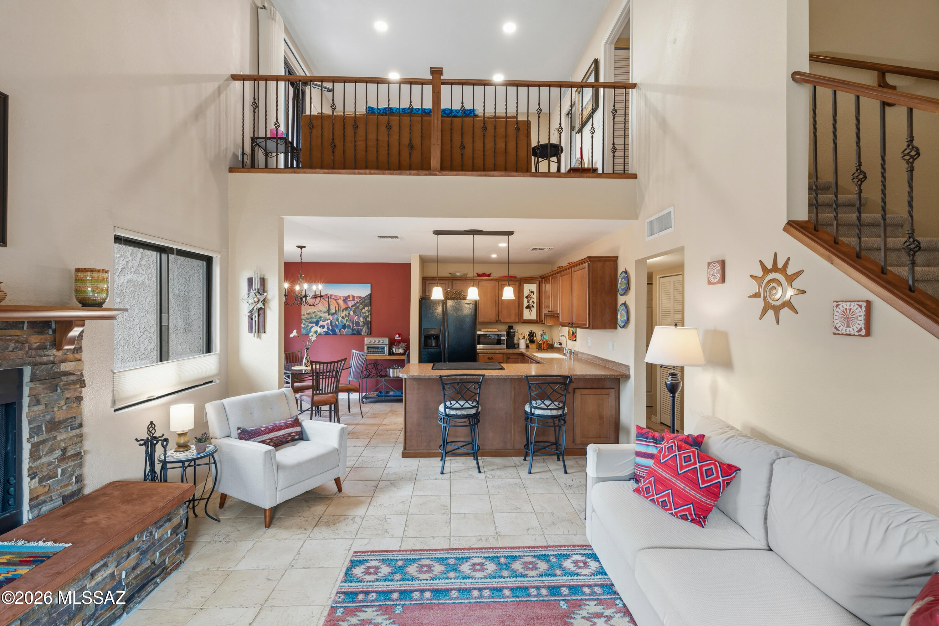 Tucked inside the gated Ventana Vista Condo community, this sought after Rose model offers 2 beds/2 baths, plus a versatile loft in 1370 sq ft of comfortable living space. New HVAC systems, water heater, windows, dishwasher, toilets, lighting and so much more! The flexible floorplan features a full bedroom and bath on the main level, with an upstairs retreat including a second bedroom, full bath, and loft - ideal for a home office, reading nook, or additional living space. Loft opens to a balcony, bringing in natural light. Thoughtfully updated with new HVAC, water heater, windows, lighting and fixtures. Offered furnished!