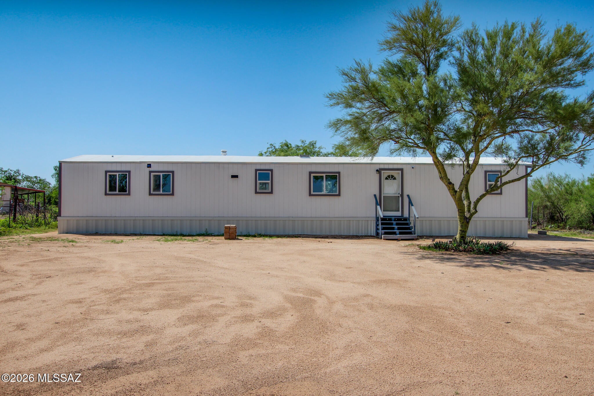 Beautifully remodeled 3-bedroom, 2-bath home situated on a spacious lot surrounded by the beauty of the Arizona desert. This move-in-ready property features updated finishes throughout, a comfortable and functional layout, and plenty of room for outdoor living, parking, toys, storage, and more. Enjoy the privacy, open space, and peaceful surroundings of country-style living while still being within convenient reach of Tucson amenities. With a fully updated home and plenty of space to make your own, this property offers a great combination of comfort, privacy, and flexibility.