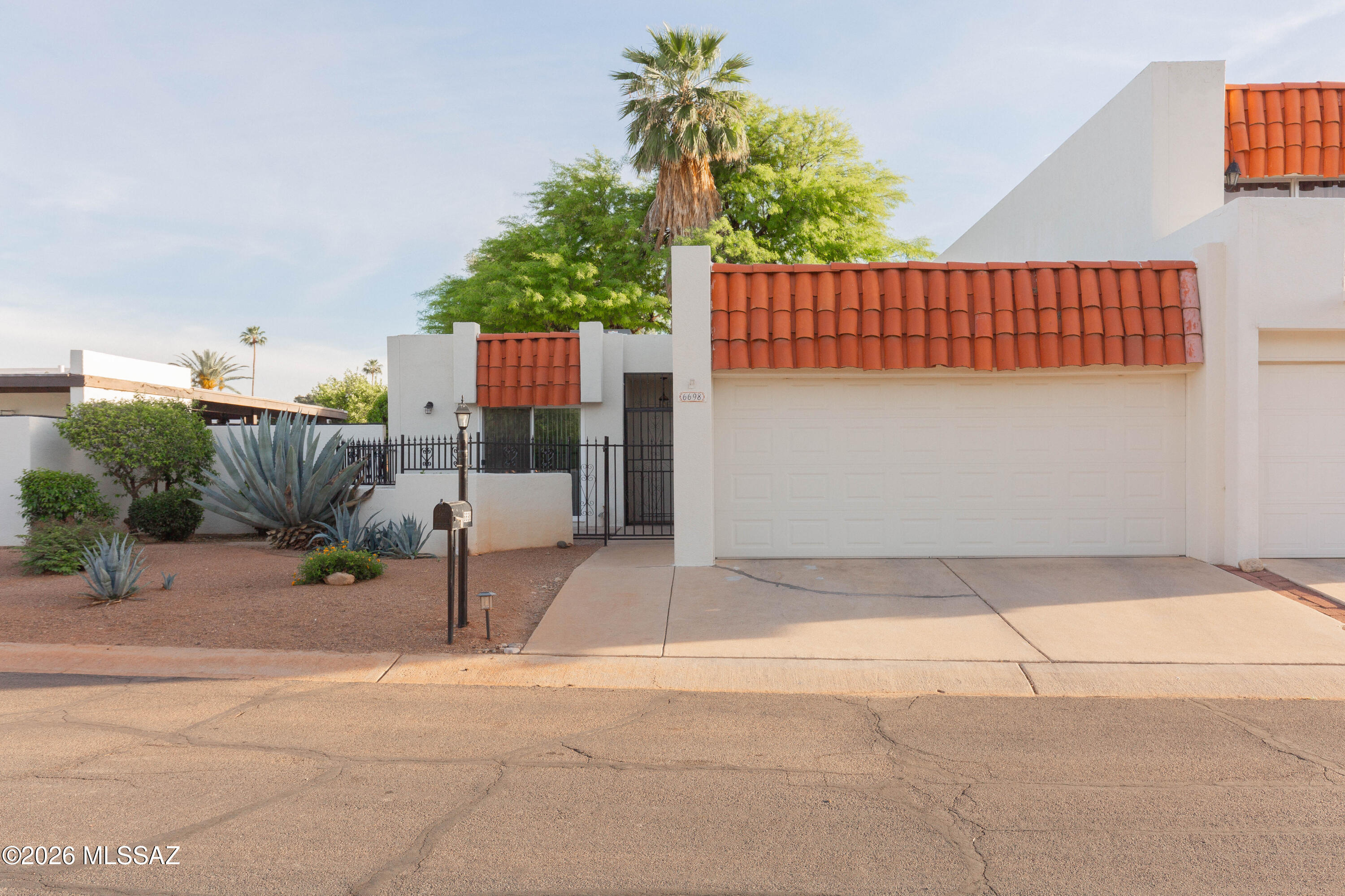 Fully remodeled and updated two bedroom, two bathroom townhome on the lush green golf course next to the community pool. Beautiful finishes all new in 2023, newer HVAC, roof, wood look ceramic tile, paint inside and out, appliances and new microwave. This community is close to shopping, restaurants, parks and other attractions. HOA covers front yard maintenance and community swimming pool. Many additional parking spaces right across the street.