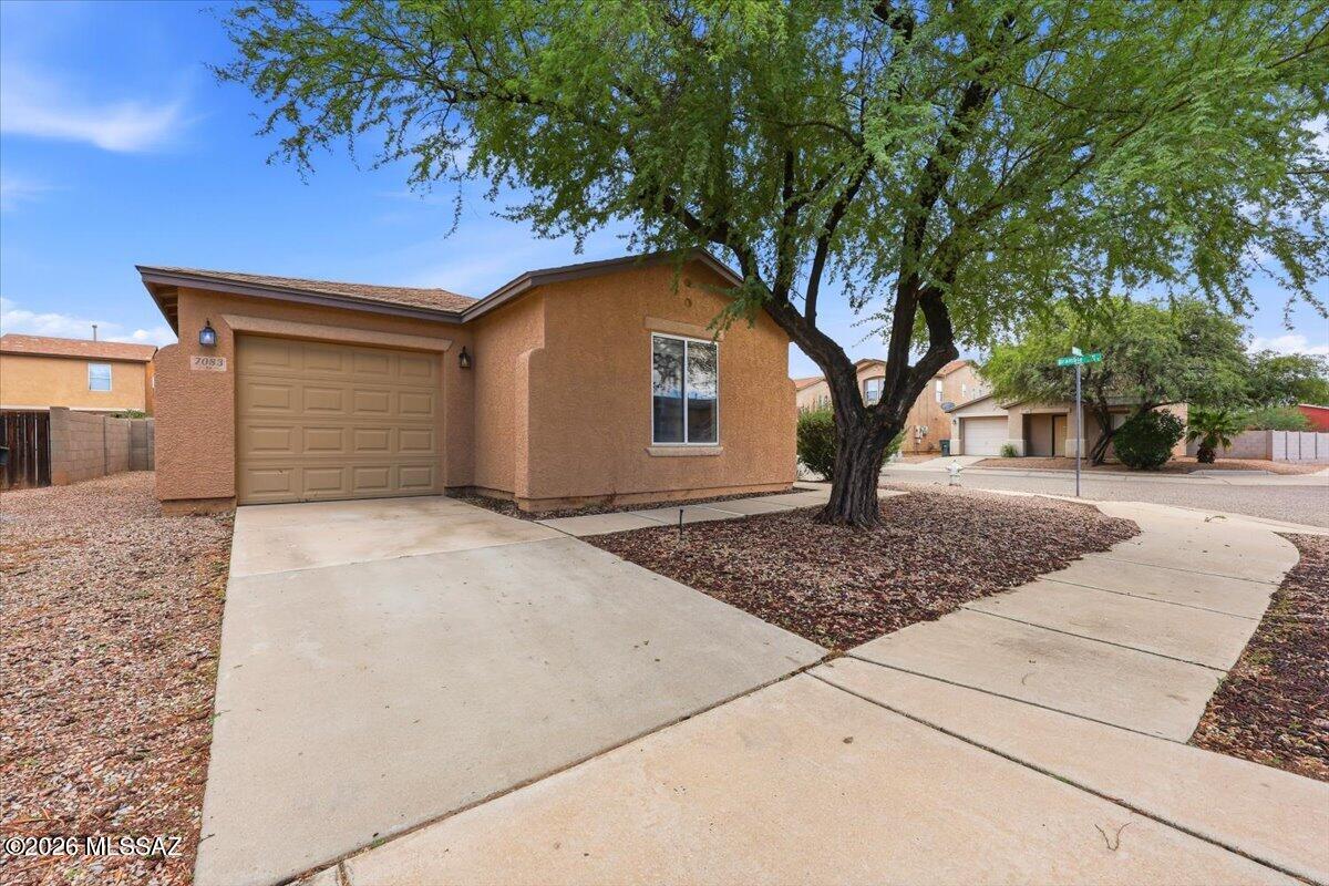 This charming 3-bedroom, 1-bathroom home offers a comfortable living space.

Positioned on a desirable corner lot with a west-facing front exposure, the property enjoys great natural light. Inside, you'll find a clean, durable layout featuring a seamless combination of vinyl and tile flooring throughout, making maintenance an absolute breeze. Designed for ease, the low-maintenance yard allows you to spend more time relaxing and less time on upkeep.