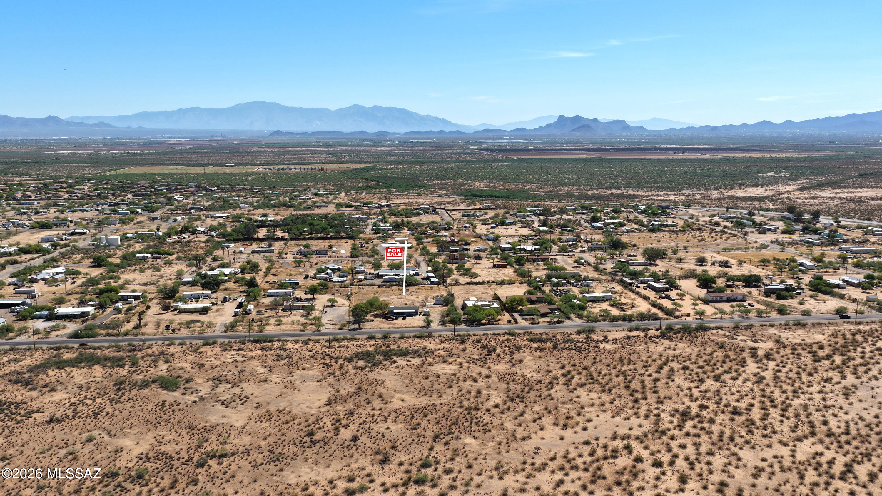 Great opportunity to own a spacious residential lot in Marana! This 1-acre parcel is part of a 2-acre split and represents the rear lot, located behind the front parcel with existing manufactured home. This lot offers a flat, usable layout with plenty of room to build your dream home or place a manufactured home. Surrounded by open desert landscape and mountain views, the property provides a peaceful setting while still being conveniently located near shopping, dining, and freeway access. Utilities nearby. No HOA. Bring your vision and make this property your own!