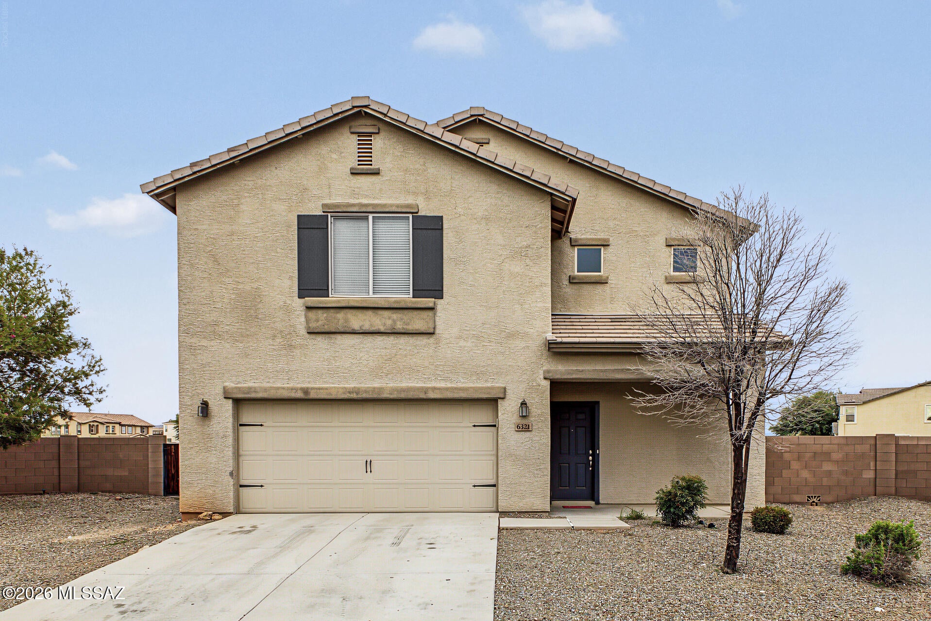 Welcome to this fantastic two-story home in Sonoran Ranch Estates! Sits on a spacious pie-shaped lot, offering 4 beds, 2 baths + powder room, & a 2-car garage. The interior showcases a neutral palette, tons of natural light, and carpet & tile flooring t/out. The large open-concept floor plan is sure to impress! The kitchen boasts built-in appliances w/gas range, a walk-in pantry, granite counters, recessed lighting, ample wood cabinets, and a 2-tier island w/breakfast bar. All bedrooms await upstairs! The main bedroom has an ensuite with dual sinks, separate tub/shower, & a walk-in closet. Check out the expansive backyard with a covered patio to relax! Whether you envision a sparkling pool, custom outdoor living space, or entertainment area, the options are yours to explore. Move-in ready!