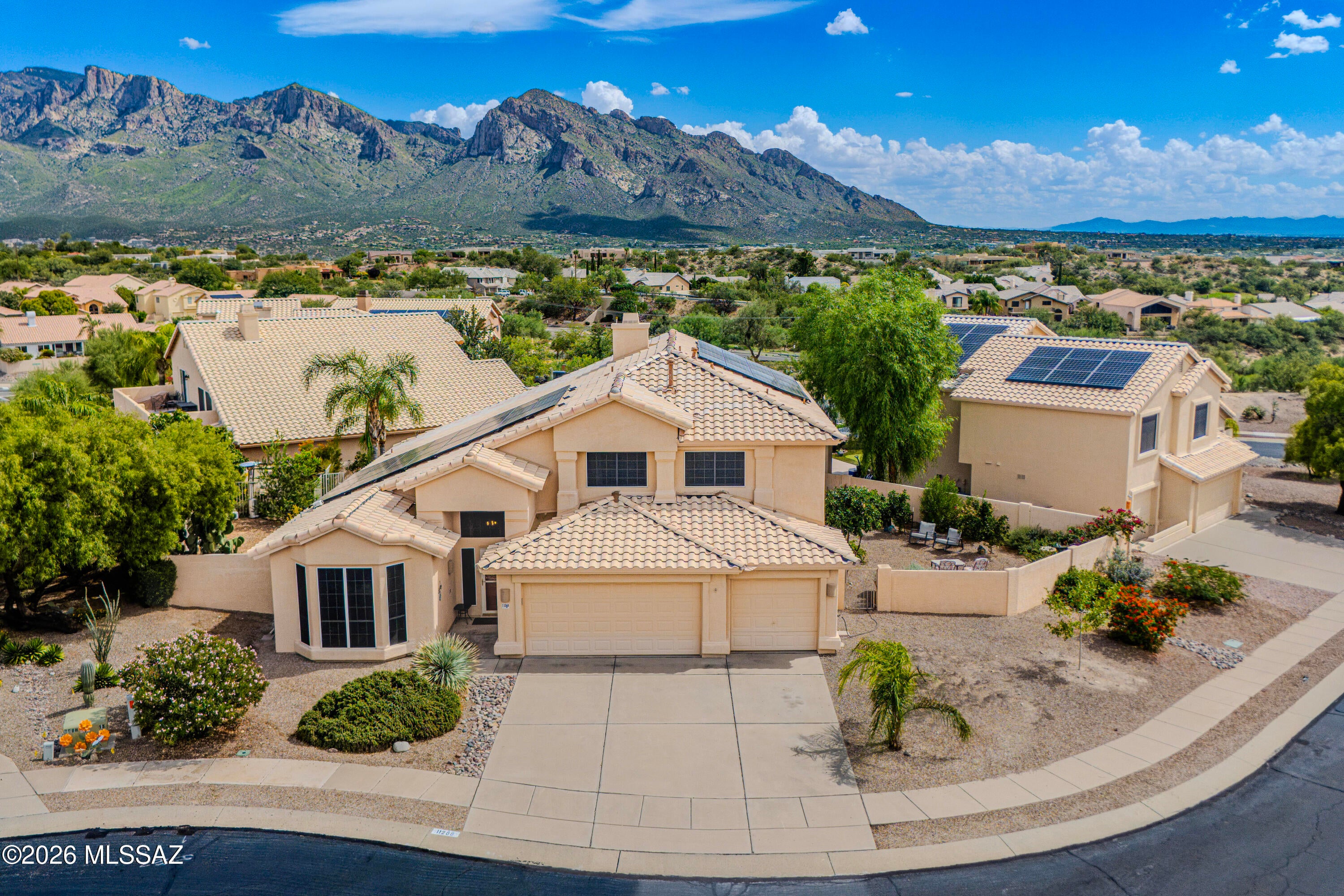 Nestled on a quiet cul-de-sac in desirable Copper Creek, this beautifully updated Oro Valley residence offers refined living with exceptional indoor-outdoor appeal. The approximately 3,000-square-foot home features four bedrooms, 2.5 baths, a spacious great room, elegant formal living and dining areas, and a well-appointed kitchen with granite countertops and stainless-steel appliances. The main-level primary suite provides a private retreat, while an upstairs loft offers flexible space for work or relaxation.

The resort-inspired backyard is the centerpiece, showcasing a sparkling pool, covered patio, lush landscaping, and stunning mountain and sunrise views. A three-car garage and an impressive list of recent improvements--including a 2025 roof, 2021 HVAC, 2024 water heater, and update pool equipment--complete this exceptional Oro Valley offering.
