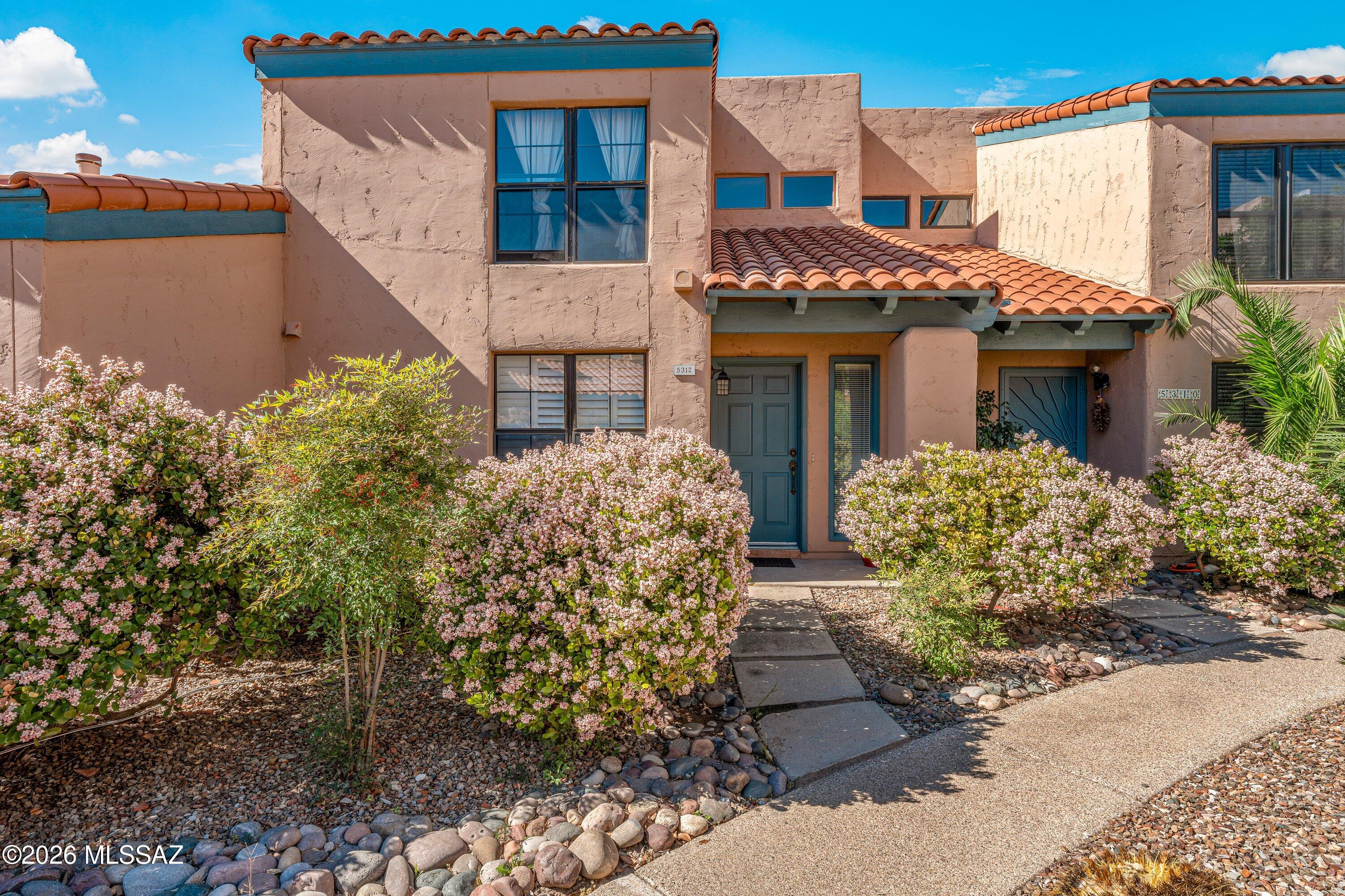 Seller will accept or counter offers between $279,900 and $299,900.  Seller is licensed to sell real estate in AZ. Set in the Catalina Foothills, this turn-key 2-bedroom, 2-bath townhome offers a rare blend of character and convenience. The living space is anchored by a striking cathedral wood ceiling, creating warmth and architectural interest, while natural light enhances the open feel. The functional layout supports both everyday living and lock-and-leave flexibility. Step outside to a private back patio--ideal for quiet mornings or relaxed evenings. Community amenities include year-round heated pools, spa, fitness center, pickleball, and tennis courts. A compelling opportunity for low-maintenance living in a highly desirable location.