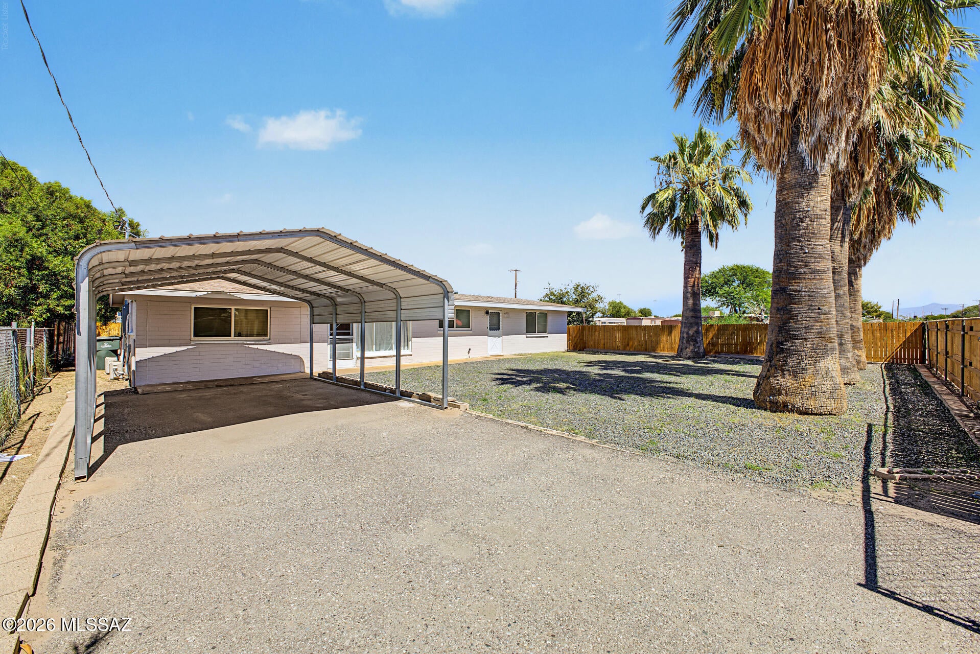 Seller is offering 3% interest rate buy down in the form of seller concessions with attractive offer during first week on market! The home has been RECENTLY UPDATED 3-bedroom home, move in ready! Fully fenced property w/ carport & gated driveway. Interior boasts clean lines that promote a modern feel! Enhanced by a fresh neutral palette, natural light, recessed lighting, & wood-look tile flooring. Seamlessly flowing living & dining room, large family room w/vaulted ceiling. The kitchen has gas range, tile counters & backsplash, white cabinets, & breakfast nook. Main bedroom has a full bathroom for added comfort. Home includes mini-split A/C systems for efficient & comfortable cooling t/out. Spacious backyard offering a covered patio & storage/laundry room! AGENT/OWNER.