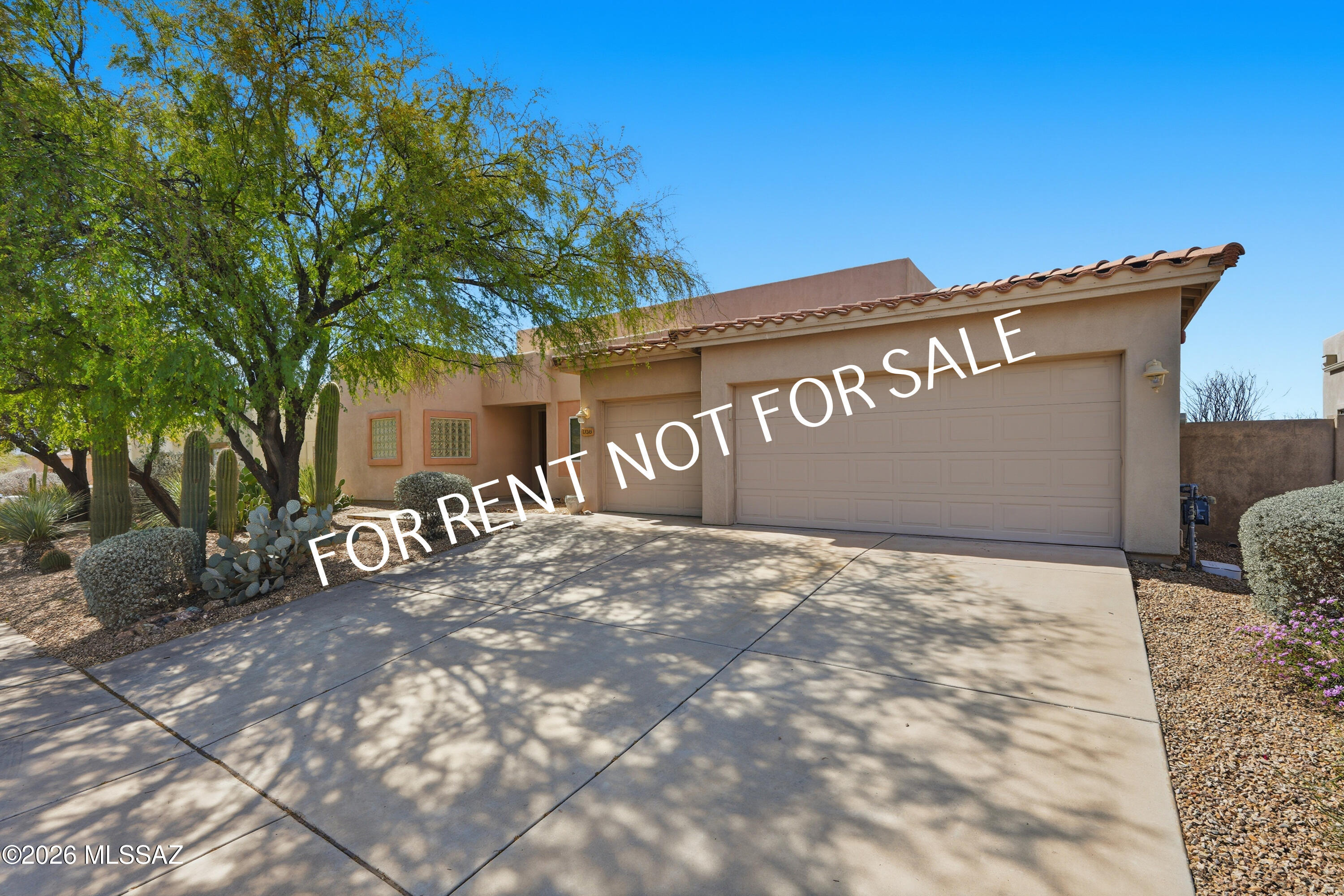 Built 2005 4 BED 3 BATH 2735 SQ.FT. beautiful single level home located in Rancho Vistoso. Bright home with modern inspiration in its design. This home has formal dining with mountain views, large living & separate family room with gas fireplace & picture window perfect for watching the incredible Oro Valley sunsets. Kitchen features granite counters, stainless double oven, microwave, cook top, refrigerator & dishwasher, w/d hook-ups Split bedroom plan offers privacy to the Master suite with soaking tub, separate shower, dual sink vanity and two walk in closets plus a linen closet. Spacious bedrooms. Enjoy the nature preserve from the backyard under the extended covered patio or by the the pool and spa. Garage has an extra step. Caution when view the garage space. Weekly pool and spa service. Whether you are sipping coffee in the morning or hosting an evening get-together, the outdoor space is designed for relaxation and entertaining. Pets are subject to approval. **Please visit our website for SECURITY DEPOSIT AMOUNT AND OTHER FEES.*