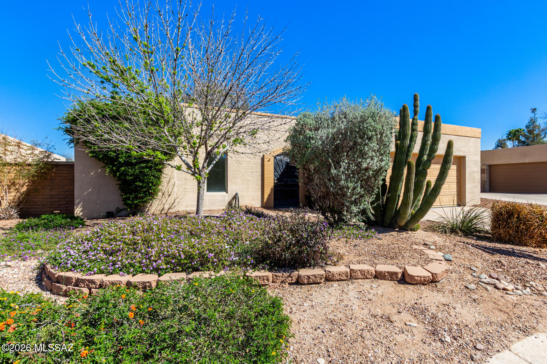 Remodeled ranch-style home in desirable Fountain Park! Solid construction with an oversized 2-car garage and storage. Interior updates include Quartz countertops, new vanities, stylish tile shower surrounds, stainless steel appliances, updated fixtures, plush carpet, and fresh paint. Enjoy a resort-style backyard with built-in BBQ, covered patio, pergola, pavers, and low-maintenance turf. Community amenities include pool, play area, and scenic walking/jogging trails. A must-see in a fantastic neighborhood!