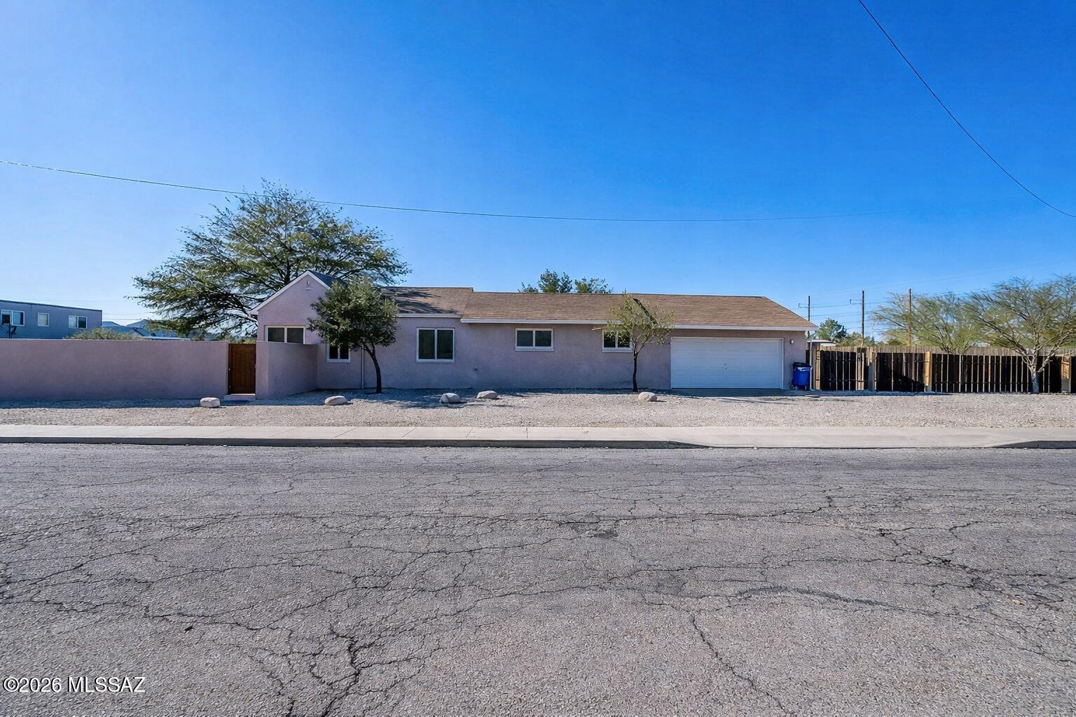 Move in ready and centrally located with easy commuting, this four bedroom, three bathroom home offers a fully updated interior with new countertops, cabinetry, flooring, doors, and modern light fixtures throughout. Positioned on a corner lot with a large private yard, plus a garage and on site washer / dryer.