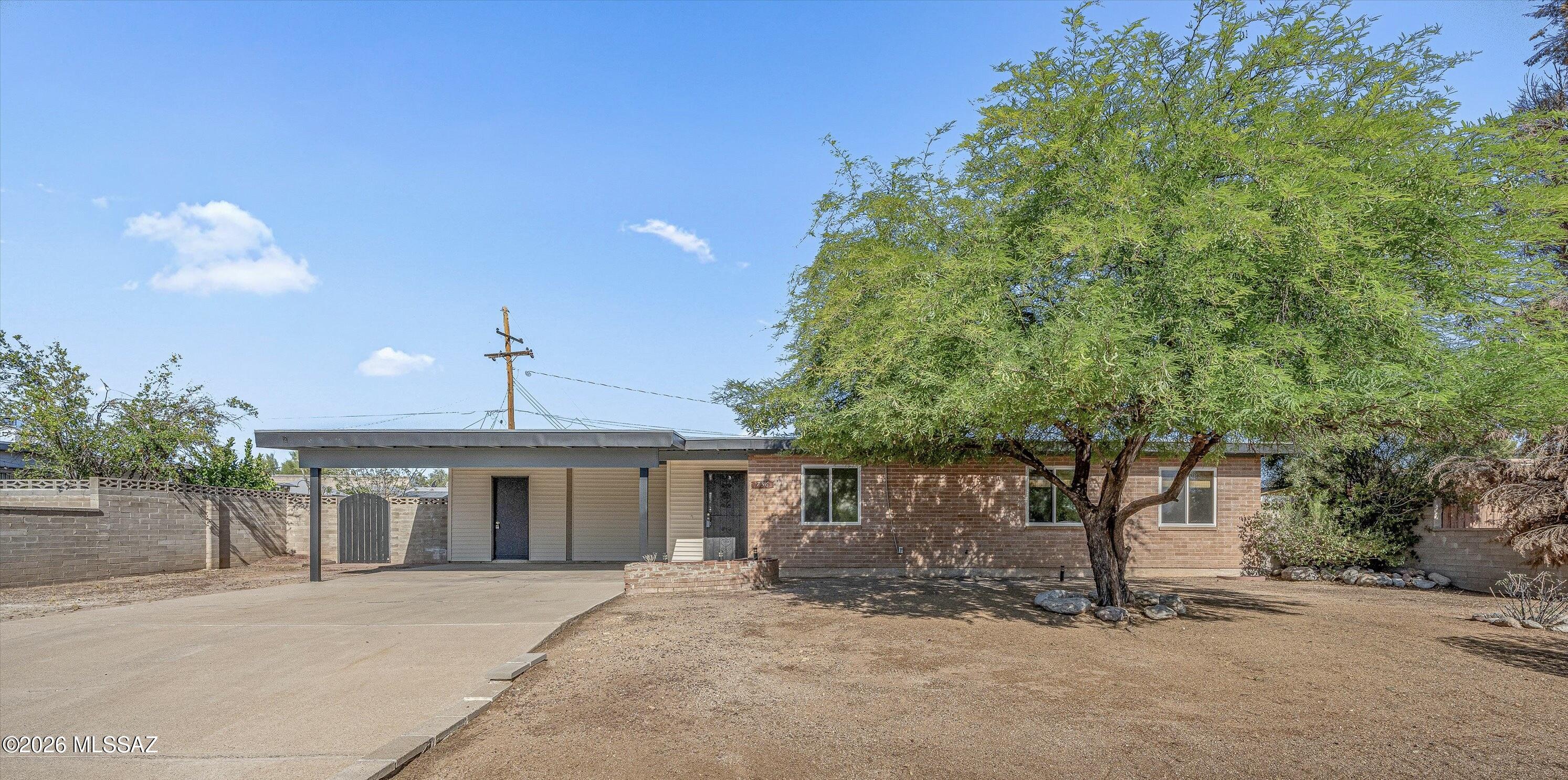 Welcome to this charming East Tucson gem located in the established Desert Steppes neighborhood. This well-maintained 4-bedroom, 2-bath home offers 1,595 square feet of comfortable living space and a backyard designed for the Arizona lifestyle. Step outside & enjoy your own private oasis featuring a refreshing swimming pool & a spacious ramada perfect for entertaining. Inside, the inviting kitchen features beautiful cabinetry & plenty of space to gather with family & friends. The spacious living room provides a comfortable setting for everyday living.  Recent improvements include fresh interior paint in the living room, kitchen, bedrooms, and hallway, as well as freshly painted exterior trim, siding, & doors, adding to the home's move-in-ready appeal.  Additional space in front for a campe or trailer, all with the added benefit of no HOA restrictions. Conveniently located near Jesse Owens Park, shopping, dining, and everyday amenities, this home also provides easy access to some of Tucson's best outdoor recreation, including hiking and biking trails, scenic Mt. Lemmon & Agua Caliente Park.  Whether you're looking for space to entertain or quick access to Tucson's outdoor lifestyle, this Desert Steppes property has it all.