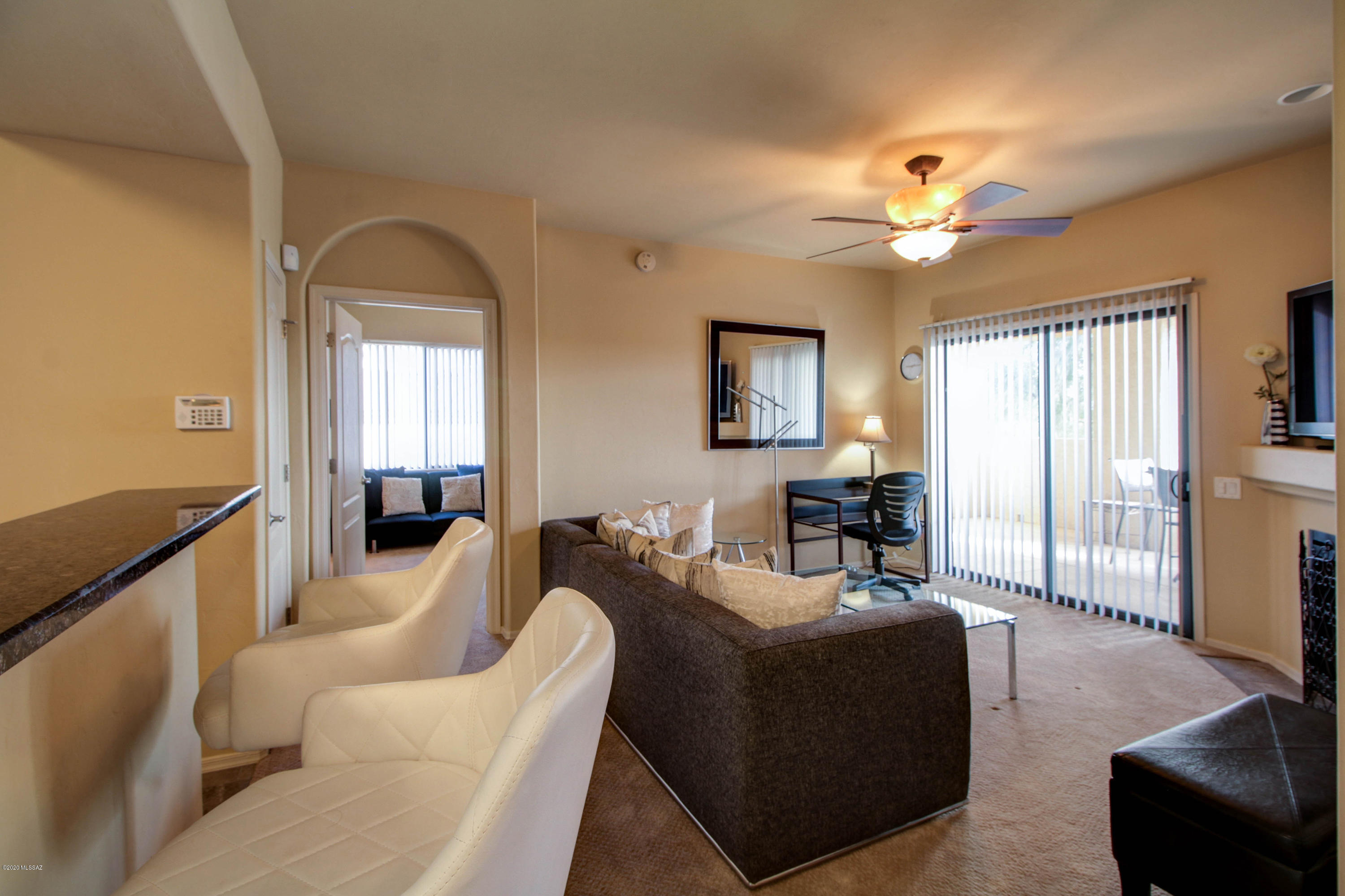 Fully furnished condo (with or without furniture) in the beautiful Catalina Foothills! Equipped with everything you need - house wares, linens, full-size washer & dryer. Relax on your private covered patio or take a dip in the sparkling pool! Enjoy shopping and fine dining just steps away from your front door, or take a walk or bike ride on the Rillito River from your private entrance. This exclusive gated community has resort style amenities that do not compare! 12-month lease or short-term, please call for exact pricing and Availability!