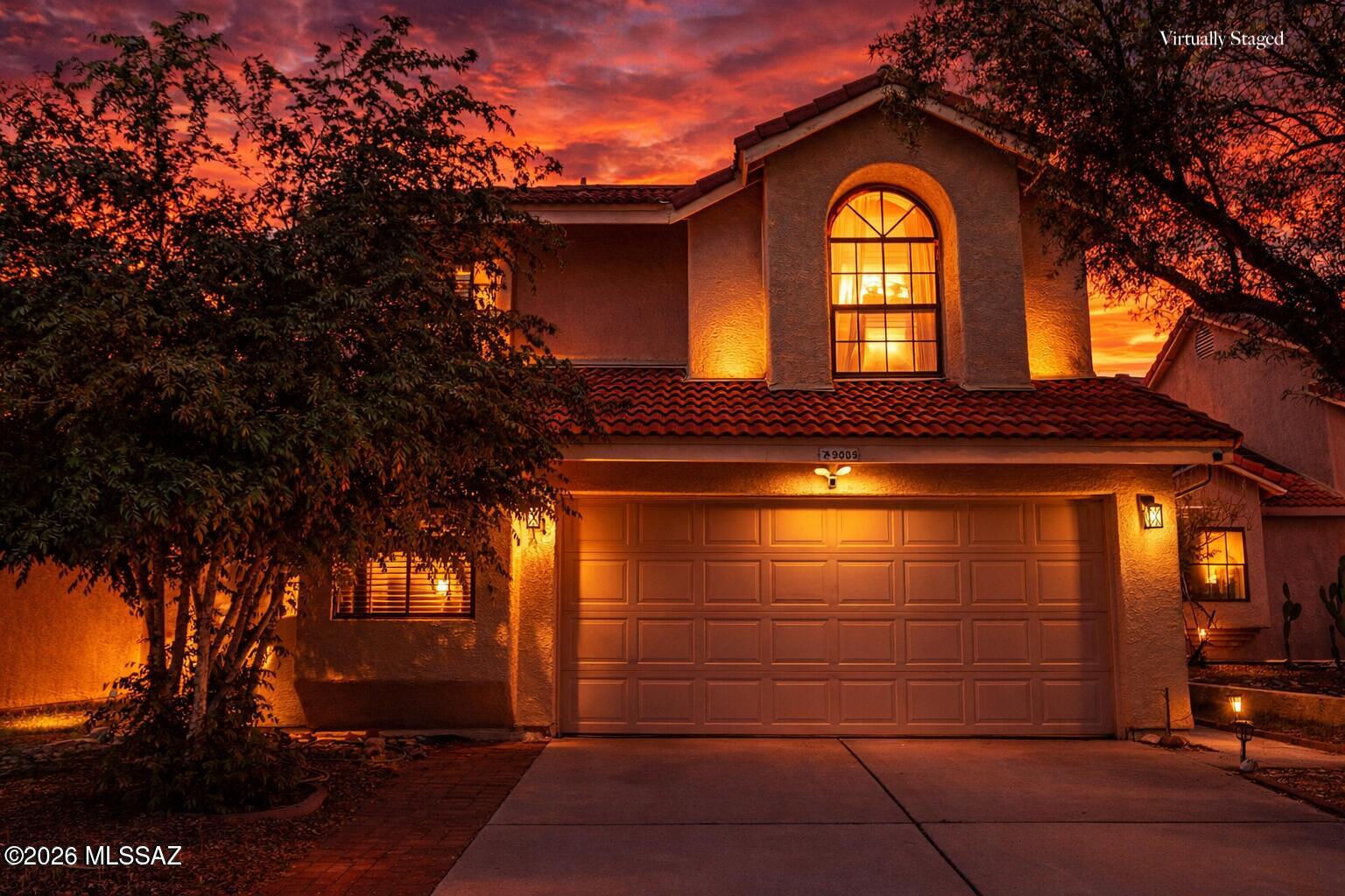 Welcome to this charming two-story home in the gated community of Countryside Valley! This well-maintained residence offers 3 bedrooms with a spacious loft, 2.5 bathrooms, and a 2-car garage, all surrounded by mature landscaping. Step inside to an inviting interior featuring designer paint, tile and wood-look flooring and soaring vaulted ceilings that enhance the home's bright and airy feel. The spacious living room is anchored by a cozy fireplace-perfect for relaxing or entertaining. The kitchen is thoughtfully designed with stainless steel appliances, granite tile countertops, a pantry, and ample espresso cabinetry for storage. The main-level primary suite offers convenience and privacy, complete with an ensuite bathroom featuring dual sinks and a separate tub and shower. Upstairs, you'll find the secondary bedrooms, a full bathroom, and a versatile loft space ideal for a home office, playroom, or additional living area. Step outside to your private backyard retreat, where you can unwind under the covered patio, enjoy the paved seating area, and relax on the lush lawn shaded by mature trees. Energy-Saving Bonus! This home includes a solar system designed to help lock in lower energy costs. The buyer will assume the existing solar lease, providing predictable monthly payments while helping avoid rising utility expenses. No Poly Pipes per previous owners disclosures.