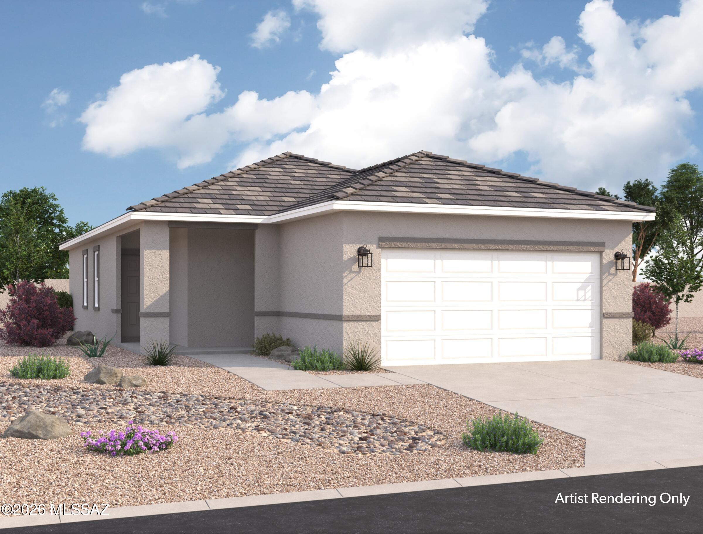 Right behind a cute little park area, our Benmore plan is in a great location!  The Benmore offers 3 bedrooms, 2 baths, granite countertops, fridge/washer/dryer, and plenty of room for game night or nachos and a movie!  Beautiful, brand-new homes featuring thoughtfully designed floorplans in the scenic Tucson community of Star Valley! Conveniently located with easy access to I-19 and major Tucson destinations, this community offers the perfect balance of comfort, convenience, and outdoor living. Homes showcase desirable upgrades including 9' ceilings, white shaker cabinets, Shaw 17'' x 17'' tile flooring, and granite kitchen countertops. Each home comes move-in ready with stainless steel kitchen appliances, including a refrigerator, washer, and dryer. Energy-efficient features include Low- dual-pane windows and a Wi-Fi programmable thermostat to help maximize comfort and savings. Exterior highlights include front yard desert landscaping with irrigation, covered patios, and spacious backyards designed for enjoying Tucson's beautiful sunsets. Residents enjoy community amenities including large park with soccer fields; walking paths and natural trails; children's play area; basketball courts; tennis courts; pickleball courts; natural-area dog park and incredible mountain views everywhere! This welcoming community offers the perfect combination of modern living and the natural beauty of the Tucson desert.