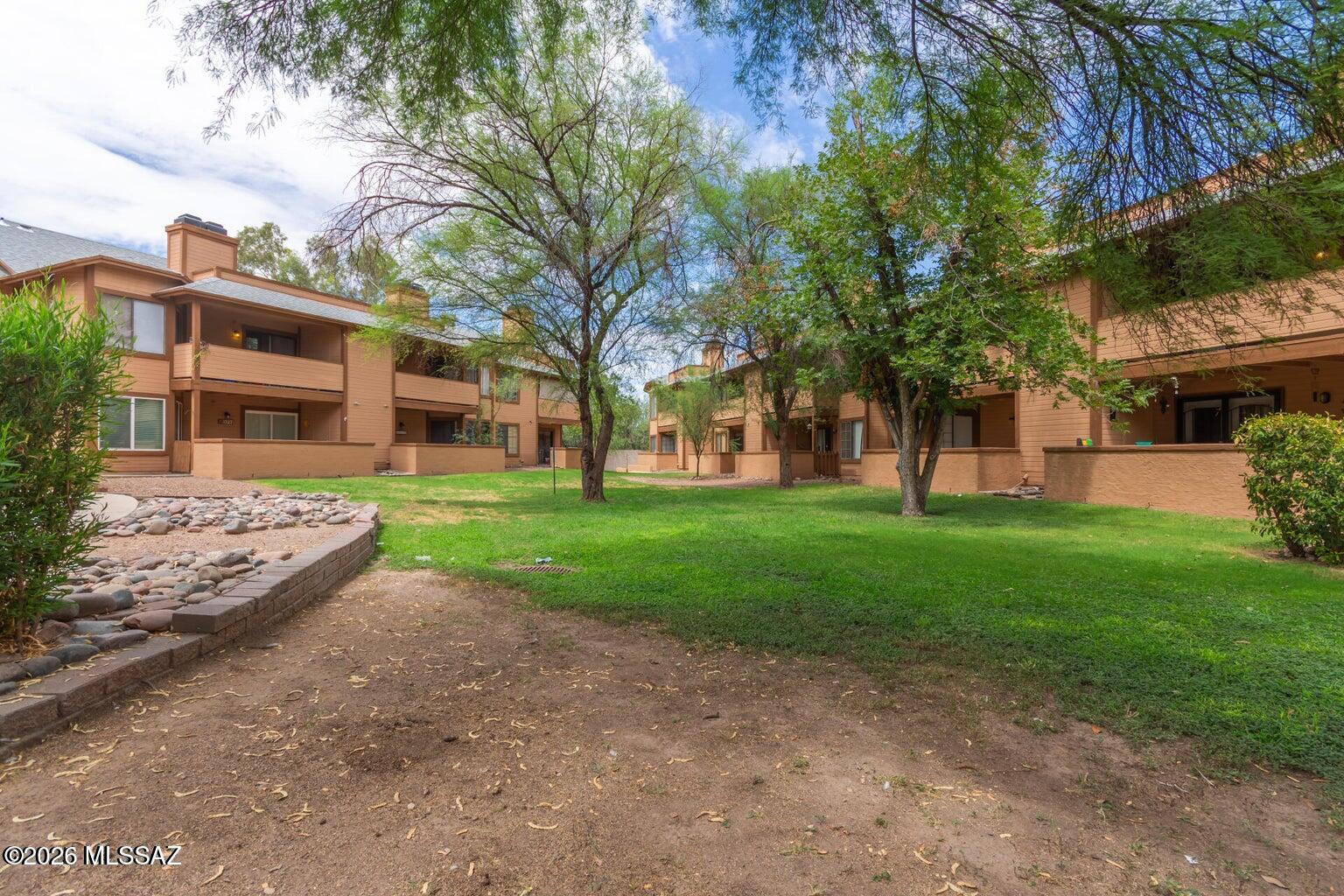 2Br, 2 Ba 1019 sq ft, down stairs condo. Kitchen open to dining area and Family Room. Nice fireplace in Family Room. Walled in patio and storage in patio area. Unit comes with 1 covered parking space. Community pool. Close to schools, bus and shopping.