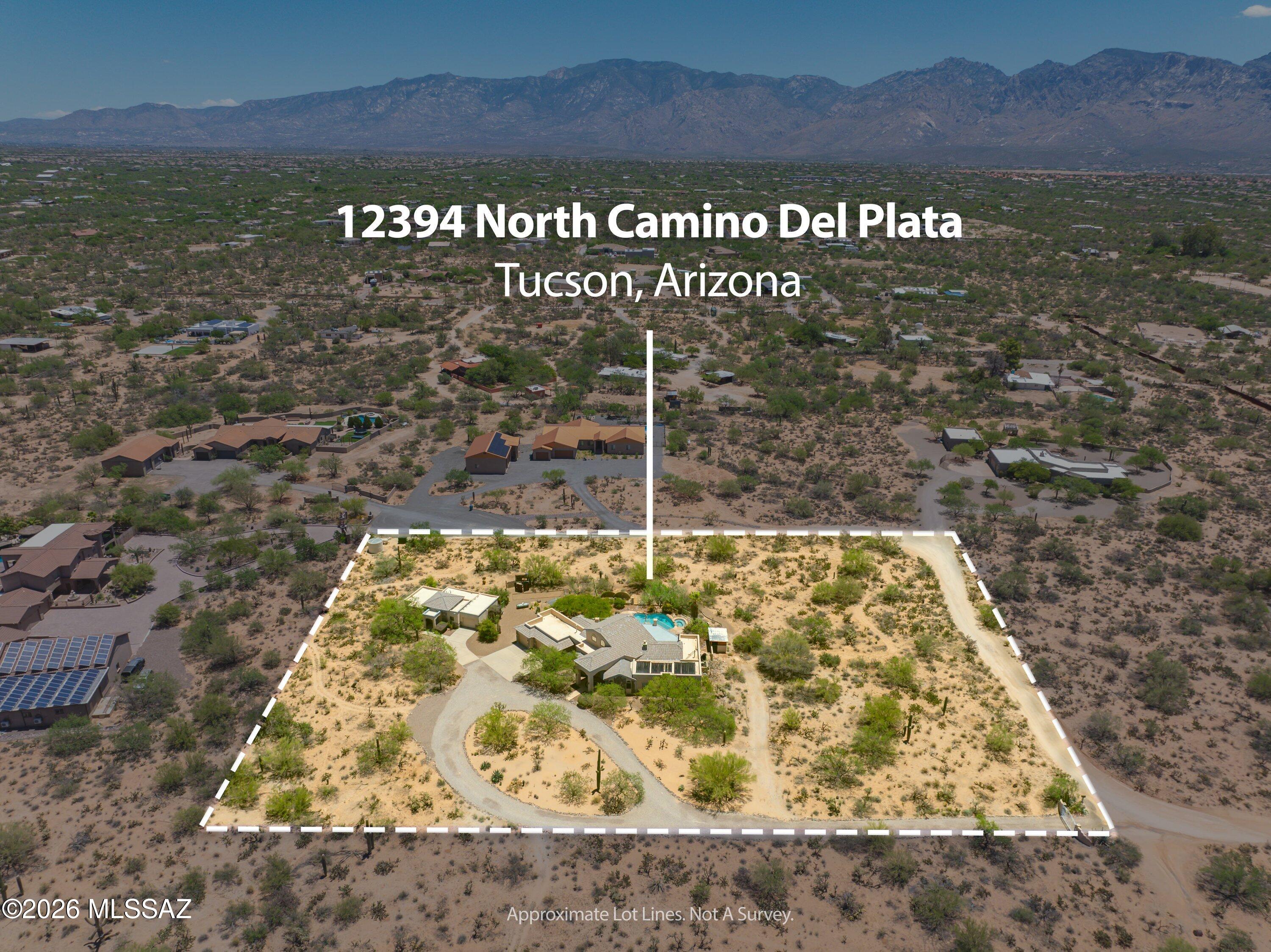 A rare opportunity to own a desert estate with sweeping Catalina Mountain views located just outside of Oro Valley, near La Cholla Air Park. This gated residence offers 3.3 pristine acres,  breathtaking views, and a proven track record as a successful short-term rental.  The main house is 3,372 sq ft and has a split 4-bedroom + Loft floor plan with 3 full baths. The Great Room has vaulted ceilings & features a cook's kitchen with Thermador gas cooktop, electric oven & walk-in pantry.  The loft & viewing deck offer front-row views of three mountain ranges and the unforgettable Tucson sunsets.  The guest house is 812 sq ft with 1 Bed/1 Bath, kitchen, living room, oversized garage with workbench & fenced yard. Over 1200 sq ft of garage space for all your toys and a luxurious pool and spa! The guest house has two wide doorways into the bathroom and a roll-in shower. There is solar to heat the pool and a whole-house water descaler system.