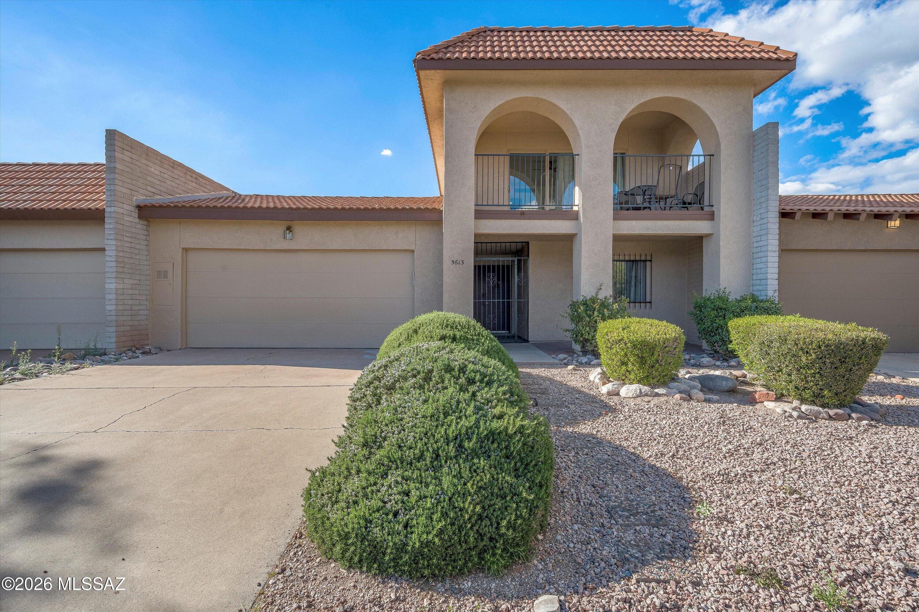 Catalina Foothills elegance meets modern updates in this exceptional 3-bedroom, 3-bathroom townhouse with breathtaking Catalina Mountain views. Located within a desirable gated community, 5613 N Calle Del Marques offers 2,322 square feet of beautifully maintained living space, a rare dual-primary-suite floor plan, and an impressive collection of recent updates.
The home's two spacious primary suites--one upstairs and one downstairs--provide exceptional flexibility and privacy. Both primary bathrooms have been thoughtfully updated with new dual-sink vanities and modern finishes, creating stylish and inviting retreats. Each suite also features a generous walk-in closet and ample storage.
The upstairs primary suite is a true highlight, offering a private balcony with sweeping Catalina Catalina Mountain views--an ideal spot for morning coffee, relaxing evenings, and spectacular Arizona sunsets. Throughout the home, expansive windows showcase the surrounding mountains and fill the interior with abundant natural light.
Additional updates and modern conveniences include WiFi-enabled ceiling fans in the bedrooms, allowing you to easily control comfort and airflow, along with refreshed finishes that complement the home's timeless Foothills character.
The spacious enclosed Arizona Room provides versatile year-round living space, perfect for entertaining guests, creating a comfortable lounge, or simply enjoying Tucson's beautiful scenery from the comfort of home.
Beyond the property, enjoy an unbeatable Catalina Foothills location just minutes from La Encantada, fine dining, gourmet markets, golf, hiking trails, and other premier amenities. The home is also directly across from Catalina Foothills High School in highly acclaimed District 16. Residents enjoy access to lighted tennis courts, jogging paths, a track during designated times, and community cultural and athletic events.
Updated bathrooms, smart-home conveniences, dual primary suites, exceptional mountain views, and a prime Catalina Foothills location make this a truly special opportunity. Experience the best of Tucson living in a home that combines comfort, style, and tranquility. Schedule your private showing today!