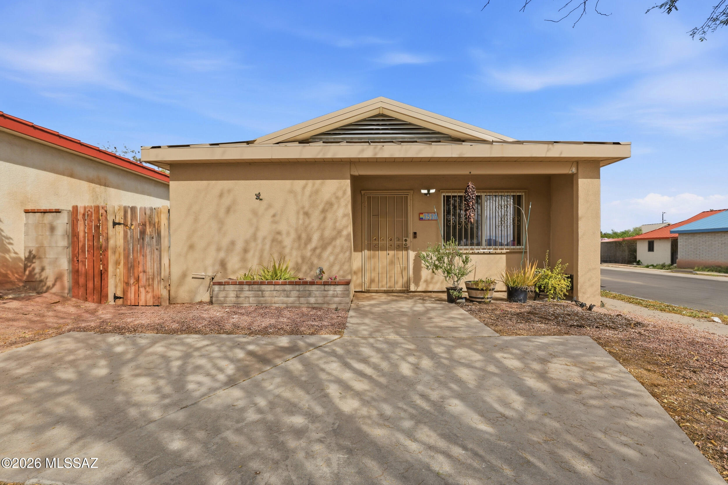 Welcome to this inviting 3 bed, 2 bath home in central Tucson, nestled within the well-located Balboa Casitas community. Built in 2001, this 1,045 sq ft single-story residence offers a comfortable and functional layout designed for everyday living. Step inside to a light-filled living area that flows seamlessly into the dining space and open kitchen, complete with a gas cooktop and efficient workspace. The split-bedroom floor plan provides added privacy, with the primary suite set apart from the additional bedrooms, creating a quiet retreat at the end of the day. Tile and concrete flooring throughout offer durability, easy care, and a clean, cohesive feel. On a low-care lot, the property features simple landscaping, slump block construction, and a metal roof for long-term value. Enjoy a convenient central Tucson location close to shopping& dining. A great opportunity for first-time buyers, downsizing, or investment.
