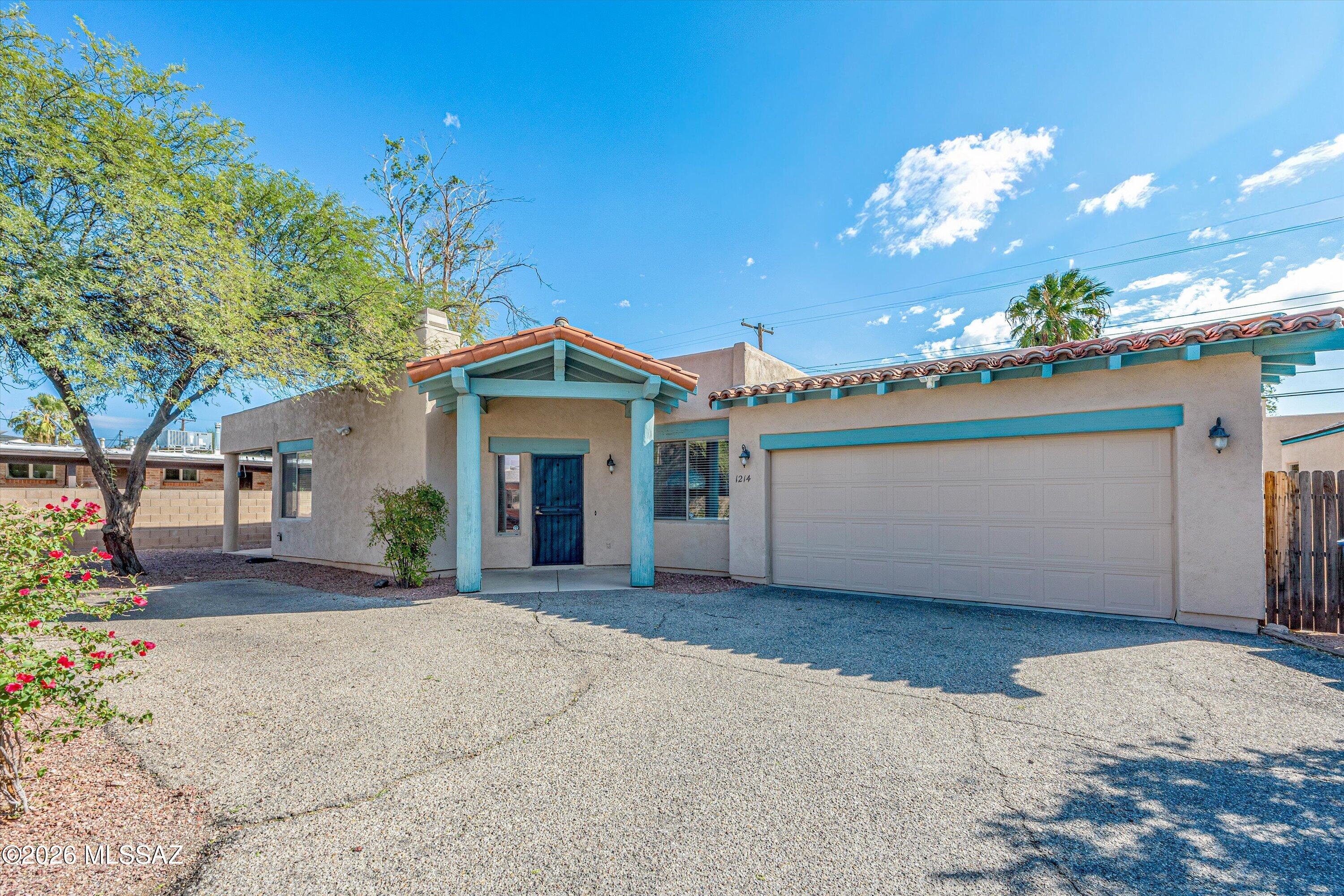 Rare find! This well cared for 4 bed / 3 bath home with 2-car garage is just north of UA, walking distance to UA campus and Banner/UMC medical center. Tucked way off the street for privacy, this home is perfect for UA parent buyers or investors. Loads of natural light, a modern kitchen with stainless appliances, cozy living room and covered rear patio. Rare 2-car garage plus 1 uncovered parking space.  Owner has made several updates including new toilets, interior re-paint, newer dishwasher and laminate floors in the bedrooms. Ask about rents, leases expire end of May 2027.