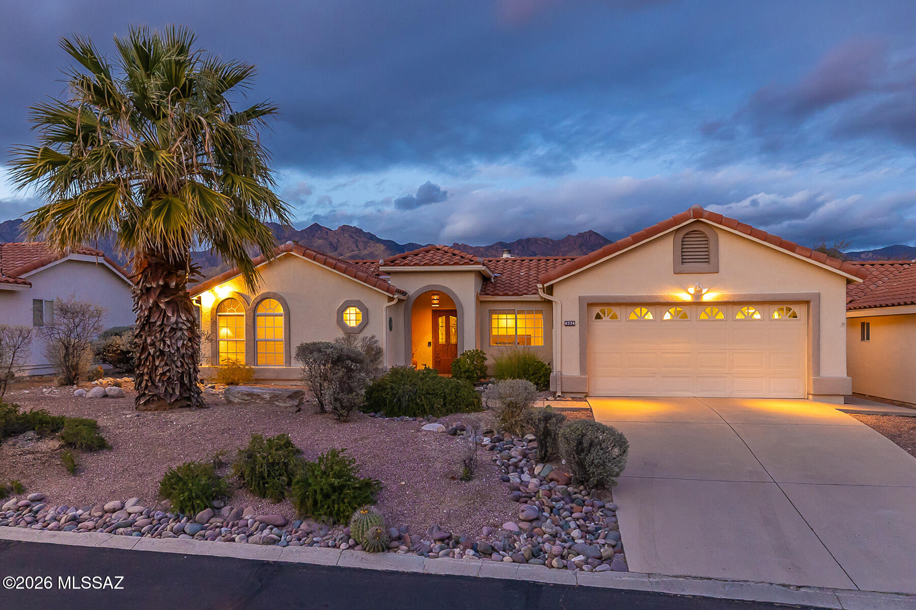 Located in Graham Estates in the Catalina Foothills, just minutes from Sabino Canyon, this well-maintained 2BD/2BA home offers 1,363 SF of comfortable living with mountain views and a private setting. Features include a welcoming LR w/fireplace, adjacent kitchen & dining area, ample cabinetry, & generous counter space, & new roof. The primary suite offers an en-suite bath and good closet space, while a second bedroom and full guest bath provide flexibility. Ceramic tile in main areas, carpet in bedrooms, ceiling fans, and window coverings throughout. Private walled backyard with desert landscaping, covered patio, and mountain views. Laundry room with utility sink, built-in garage cabinetry, and excellent storage. Offered fully furnished and truly turnkey. N