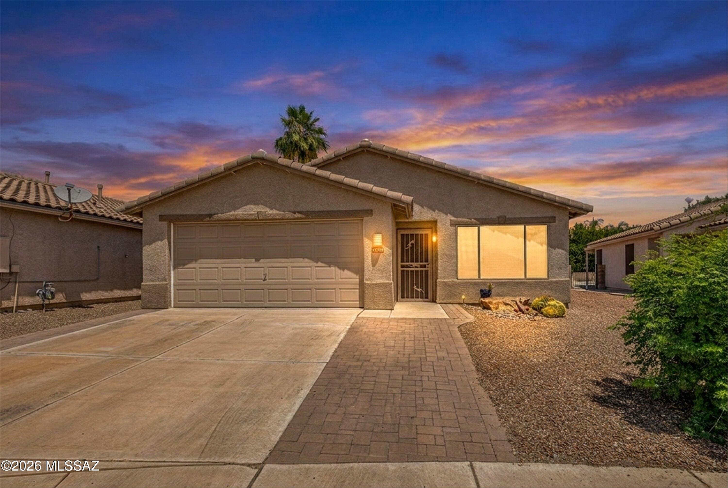 Welcome to a rare one-owner, well-maintained home in the charming & prestigious Bluffs community. 
This delightful 3-bedroom, 2 bath offers a perfect blend of comfort and style on a quiet cul-de-sac with a mountain view.  
As you step inside, the open floor plan boasts a spacious family room, with a cozy living room open to the kitchen on the other side. Completed with all tile and VLF flooring, newer interior paint and vaulted ceilings. The expansive kitchen is a chef's paradise boasting all newer appliances that include a GE Profile gas range and microwave, a free standing all wood island, quartz countertops plus abundant prep space and cabinetry.

The spacious primary has a large ensuite, complete with a  beautiful spa like shower and walk-in closet. SEE MORE TAB The second and third bedrooms have professionally installed built-in adjustable closets for ample storage. 

The great room has a modern Pella patio door with built blinds opening to a beautiful backyard with a paver patio for entertaining & a no irrigation all desert indigenous bougainvillea plant landscape with a lighted seating retainer wall. Close to entertainment, schools, shopping, recreation & more. Great Location!

Upgrades on this home include a newer roof with 2 layers of synthetic underlayment, exterior paint, Lennox HVAC system, Rheem water heater and extended paver driveway for additional parking. 

This move-in ready home awaits you!