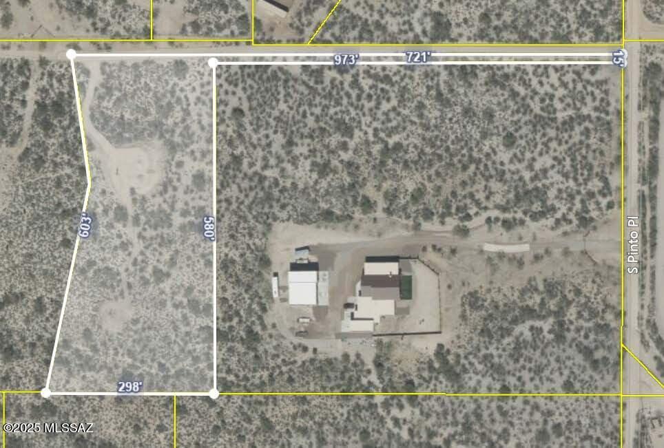 Beautiful building site on 3.74 acres near Saguaro National Park East with Majestic Views of both the Catalina Mountains and the Rincon Mountains.  Entry drive already in place, with drainage.  Two building sites have been graded and compacted.  Water & Electric at site.  Survey available.  No HOA. Located in Tanque Verde School District.  This horse property offers a stunning place to build your Dream Home!