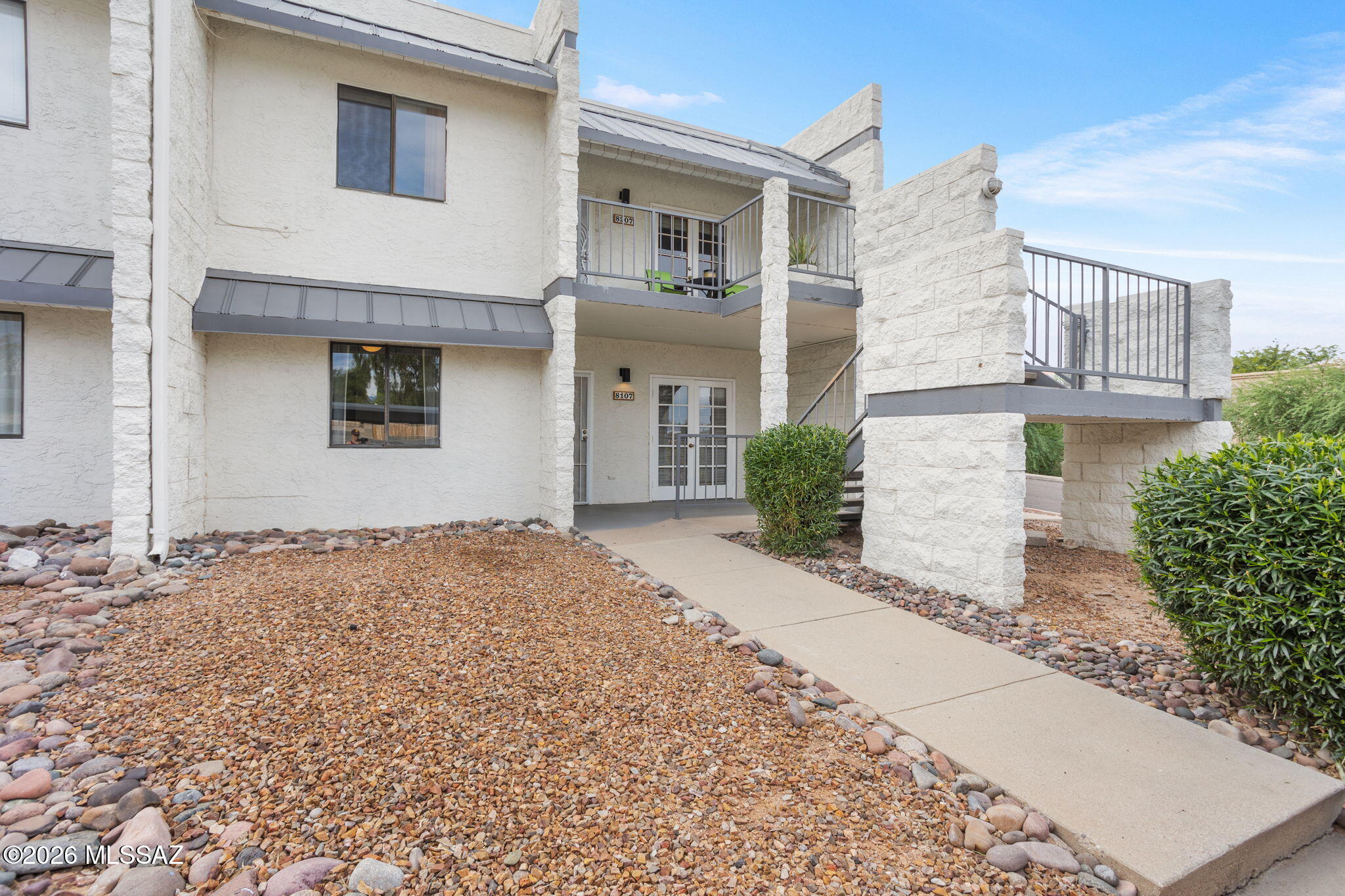 Range priced, seller will accept or counter offers within the range of $155,000-$185,000 Beautifully maintained 2-bedroom, 2-bath ground-level corner condo offering comfort, privacy, and easy, turnkey living! The bright, open layout features oversized windows, NEW kitchen cabinets, and inviting front and back patios, including a desirable north-facing patio perfect for relaxing or entertaining. Enjoy the added privacy of solid block construction and a prime location just steps from the community pool, BBQs, ramada, and grassy park area. Home includes one covered parking spot and plenty of guest parking. HOA includes water and roof coverage, and short-term rentals are allowed, making this an excellent opportunity for homeowners or investors alike!
